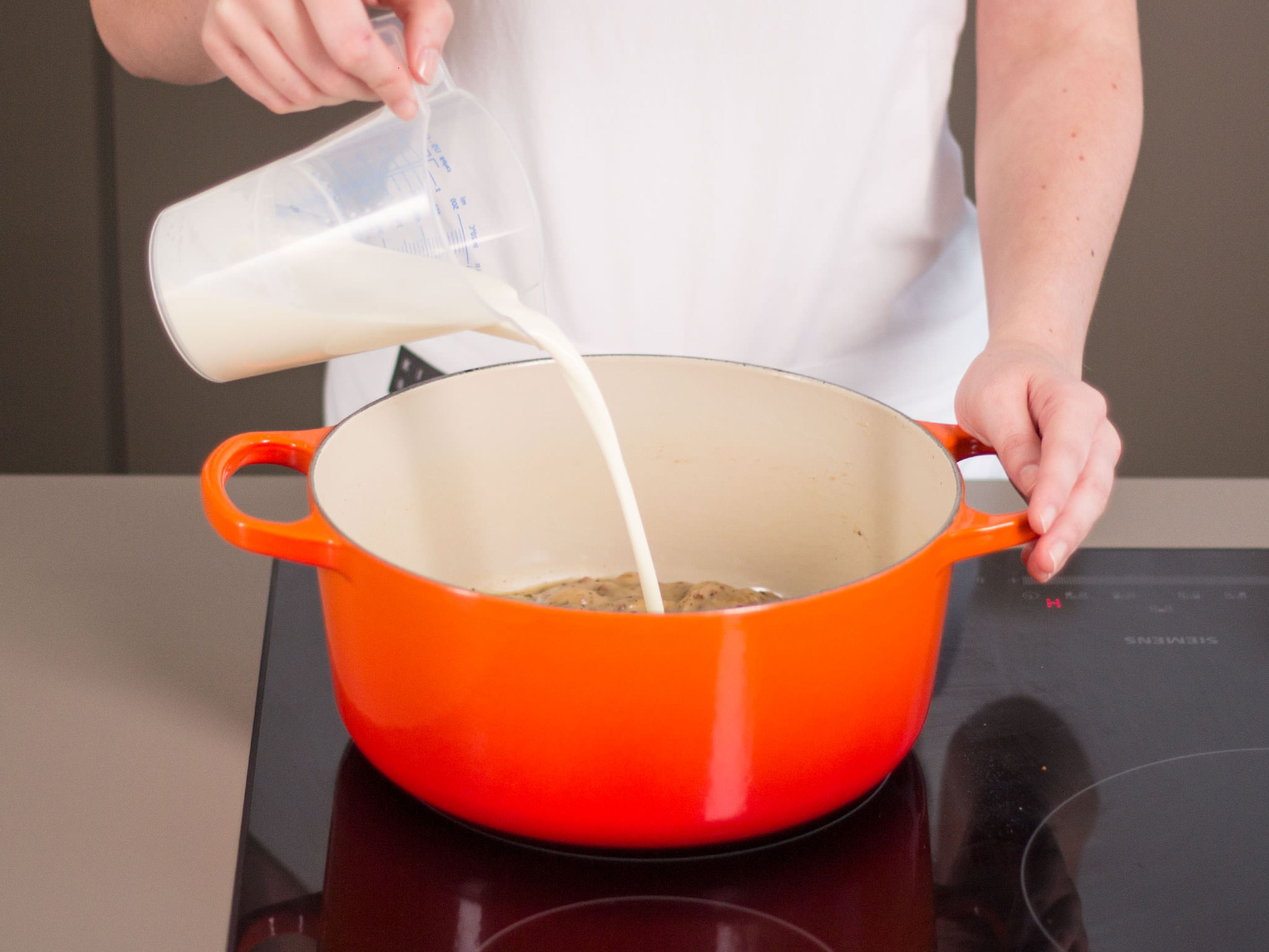 Melt butter in a pot. Add bacon and sauté until crisp. Add garlic, diced onions, and mushrooms, season with salt and pepper, and sauté until soft. Add flour and stir until incorporated. Deglaze with vegetable stock.