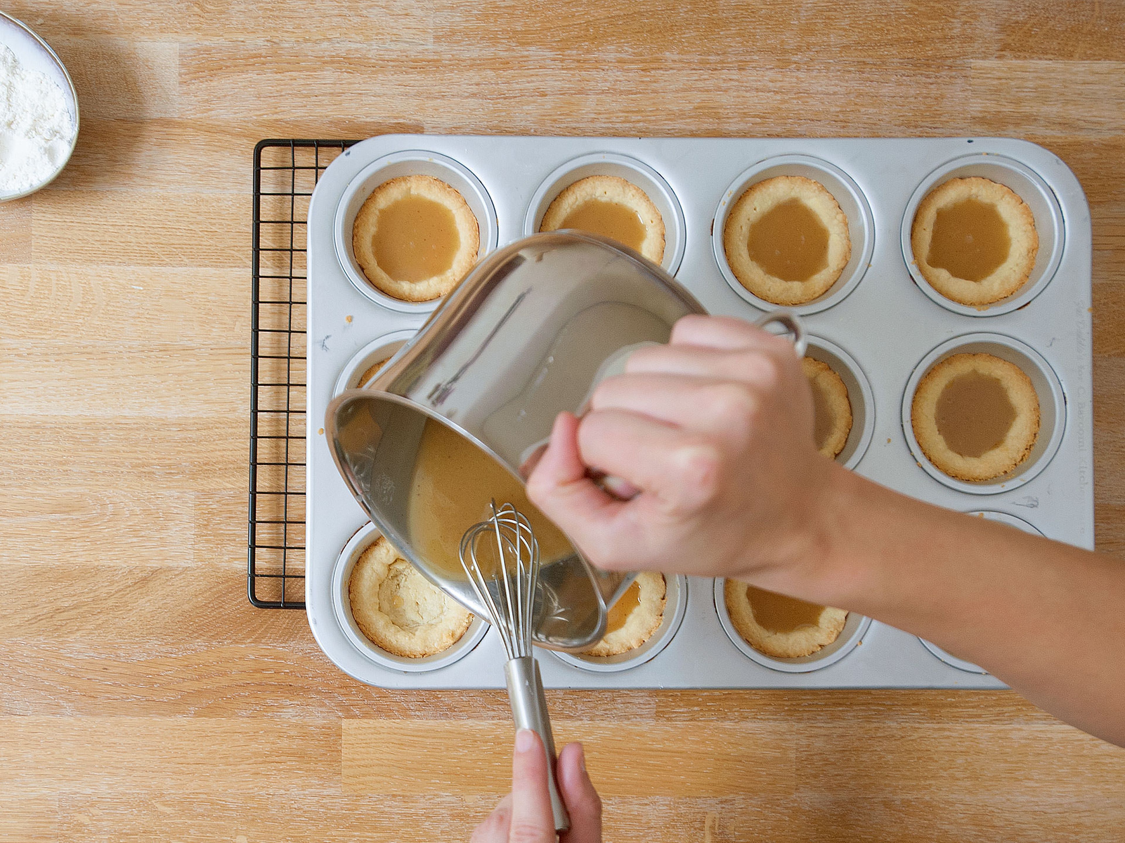Pour caramel into each muffin cup and bake for approx. 6 – 8 min., then set aside to cool.