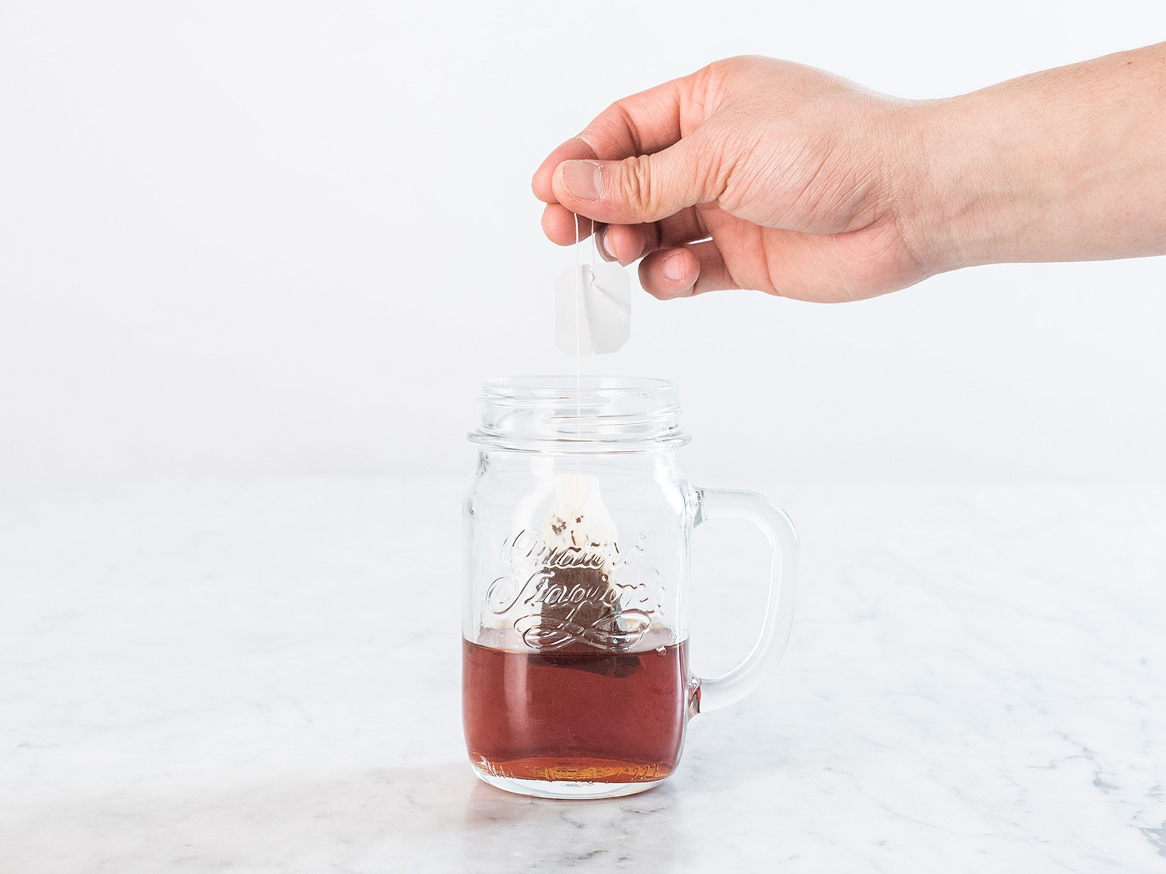 Add hot water to a mug, add teabag, and allow to steep for approx. 5 min. Transfer to refrigerator to cool for approx. 10 min.
