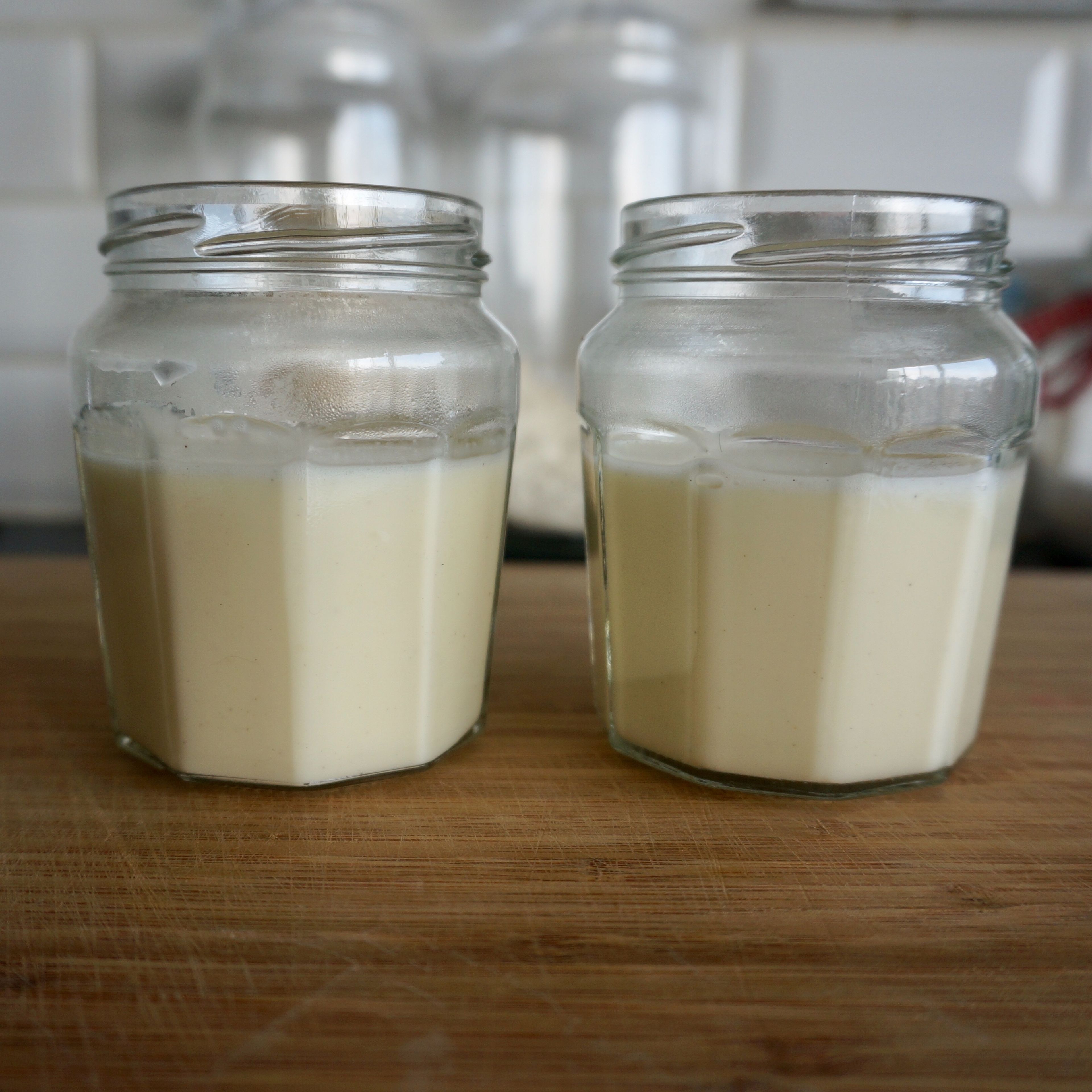 Pour cream into 2 individual serving dishes. Refrigerate for at least 3 hours, or until completely set.