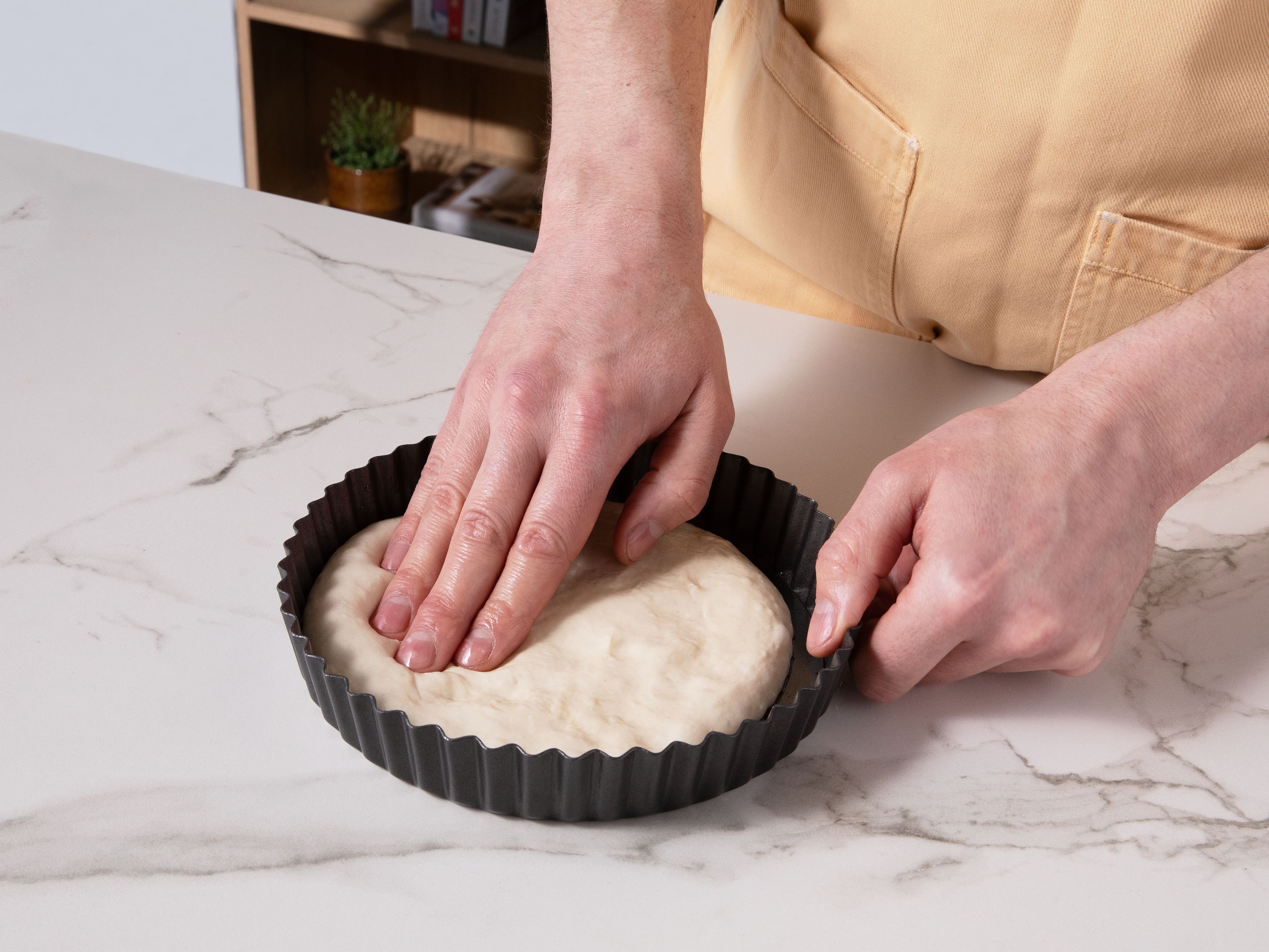 Once the final fold is done, transfer the dough to a well oiled air fryer baking dish. Cover with foil and let rise in the fridge overnight. For a faster option, let rise at room temperature for approx. 2–4 hrs., until the dough significantly increases in size.