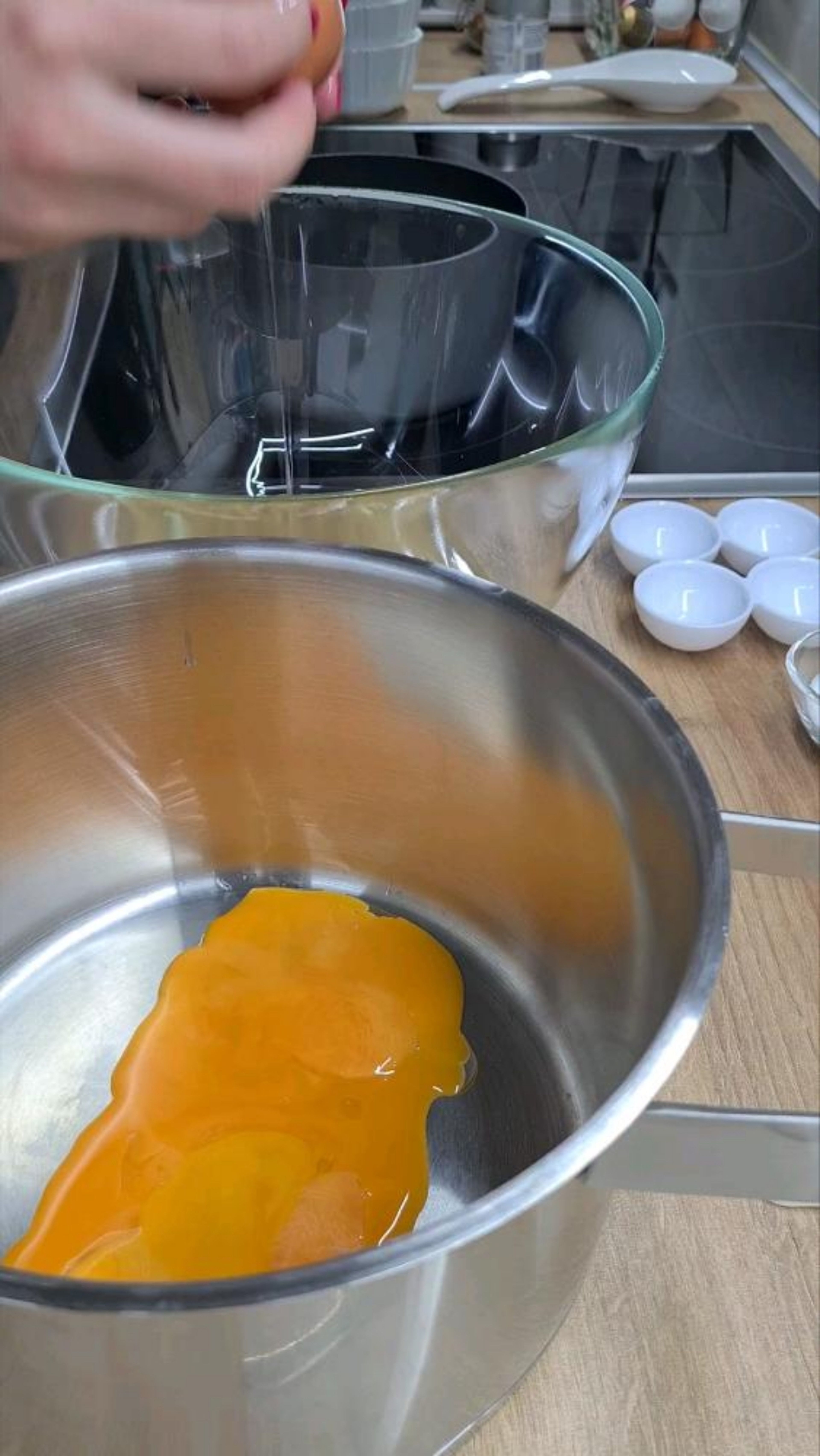 • Separate the egg whites from the yolks and set aside until ready to whisk. • Boil milk in a medium saucepan. • In another pan, mix the egg yolks with the sugar until lightly browned. Add flour and whisk to combine. • Pour about 1/3 of hot milk over the egg yolk mixture and stir. • Add the rest of the milk and return to a low heat (6/9 on the stove). Stir constantly until thickened.