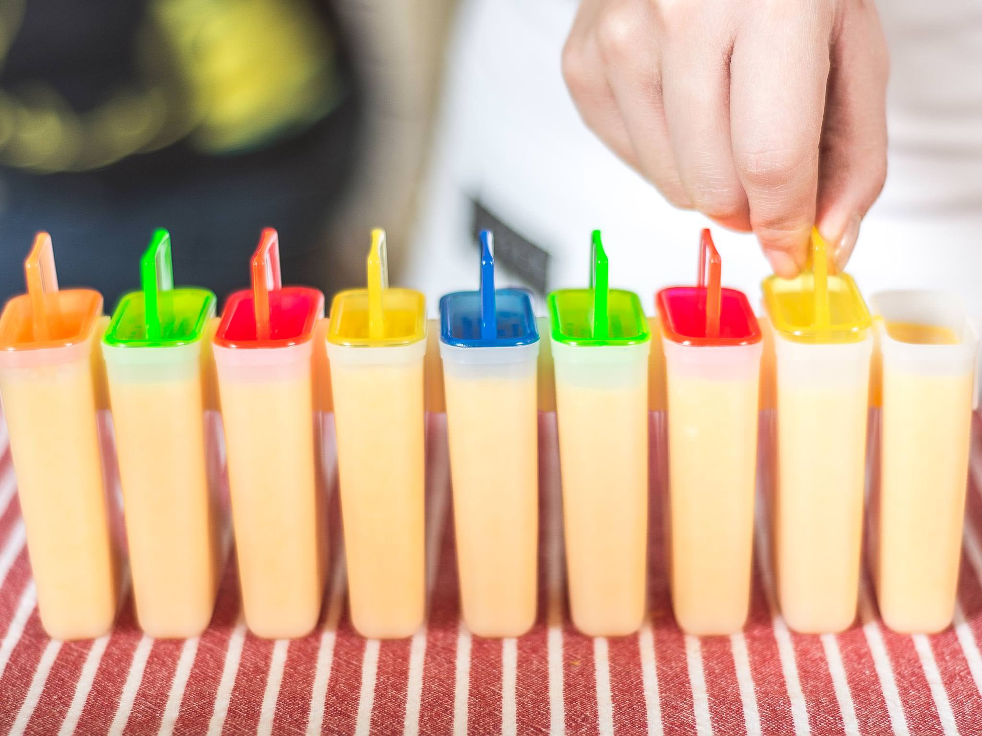 Next, fill the popsicle molds with the mixture. Freeze for at least 4 - 5 hours. Enjoy!