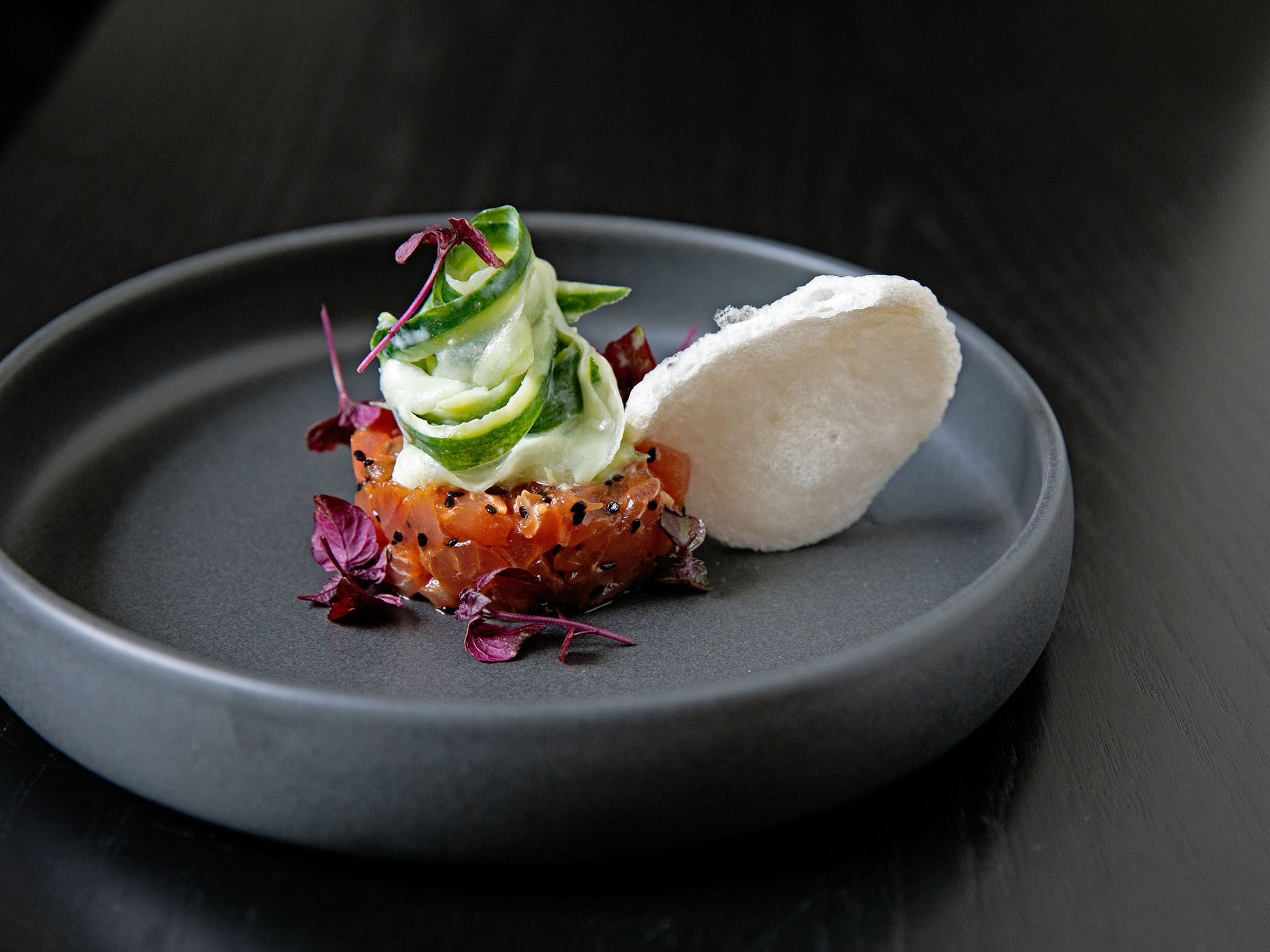 Tuna tartare with wasabi, cucumber, and prawn crackers