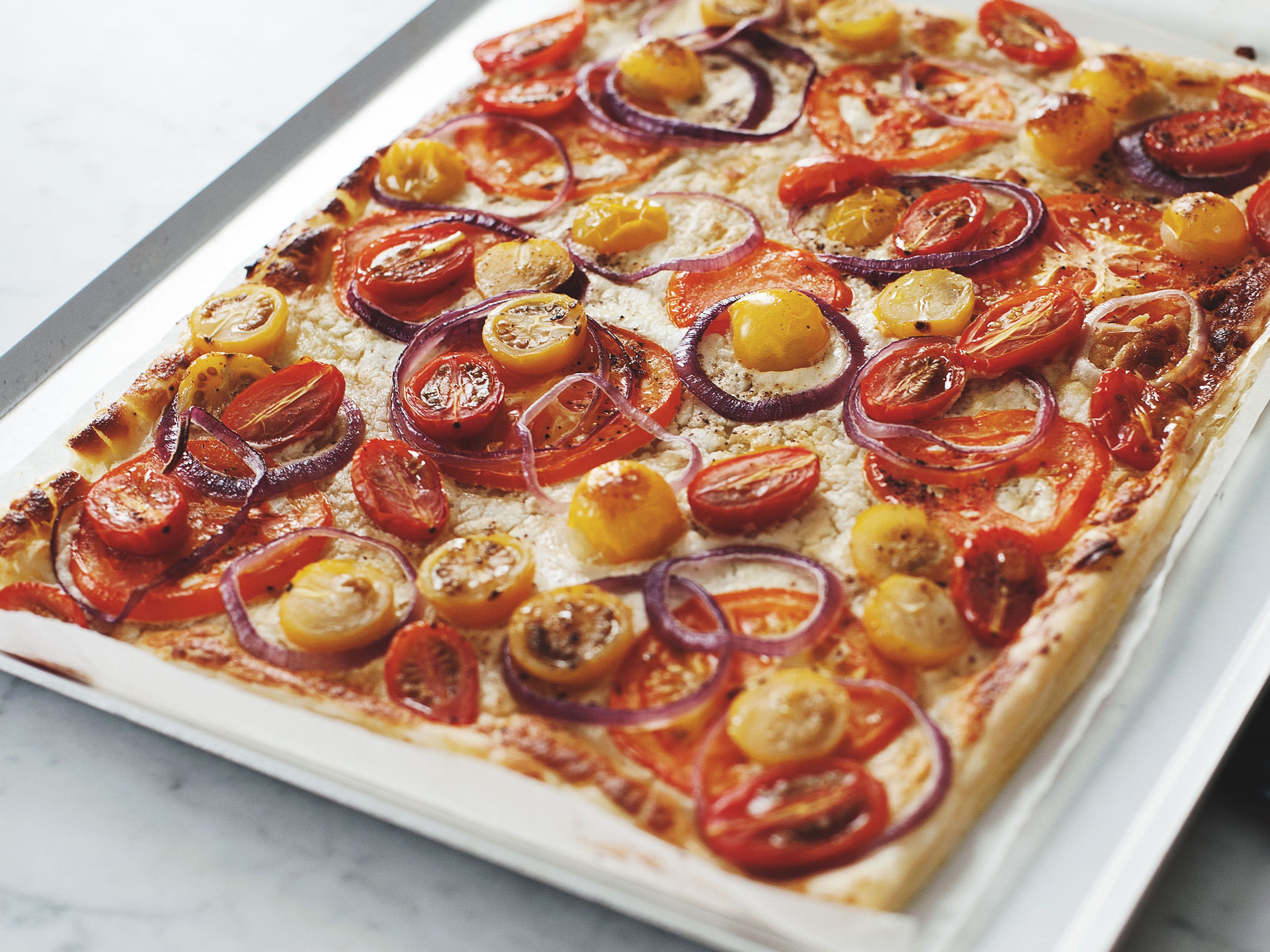 Mixed tomato and goat cheese tart