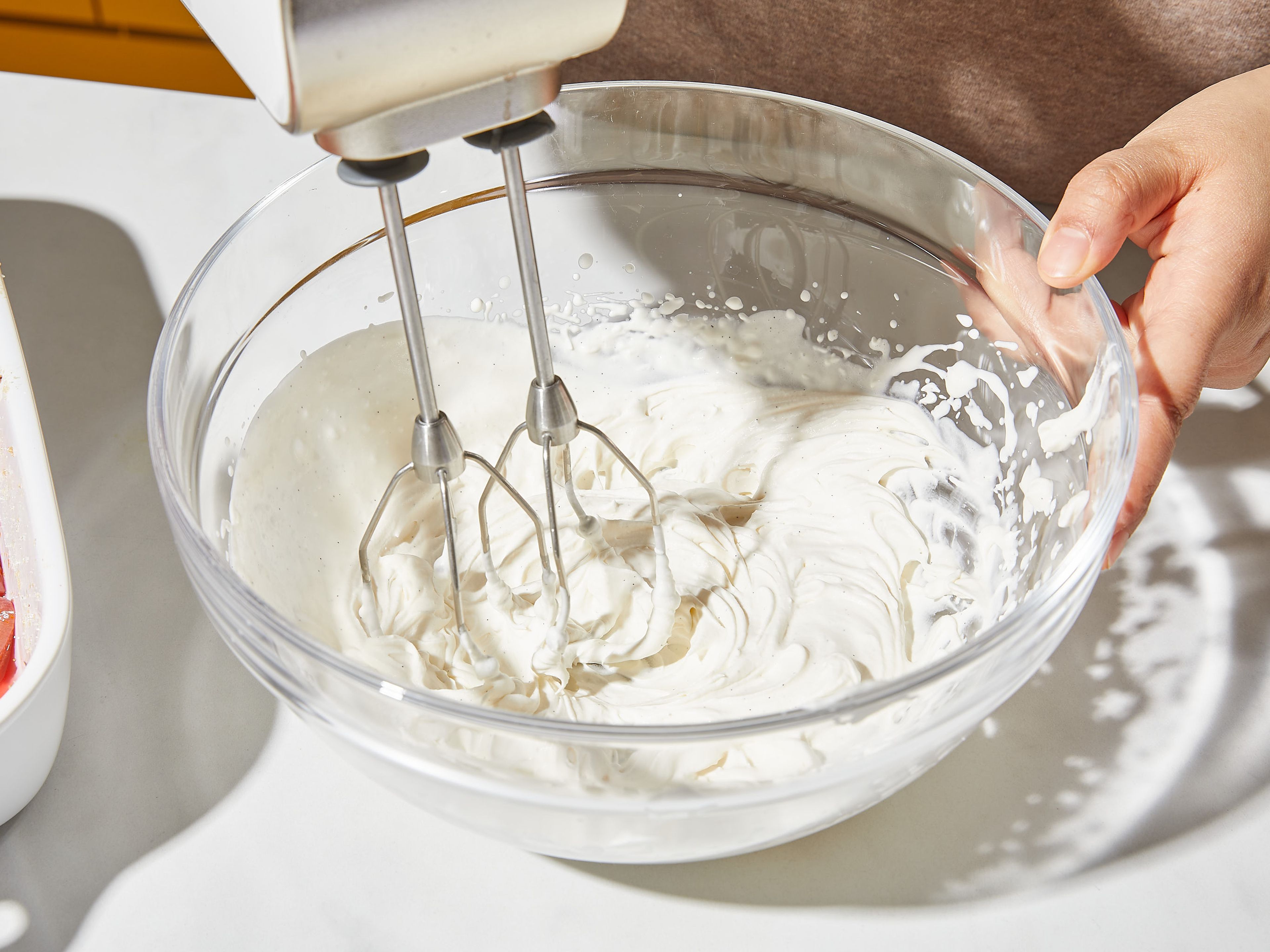 Use a hand mixer with beaters to whip heavy cream and vanilla extract in a large bowl, until soft peaks form, then add remaining sugar, beat until stiff. Gently fold in the quark. Add whipped cream and rhubarb to serving glasses or arrange on plates. Garnish with chopped pistachios. Serve immediately and enjoy!