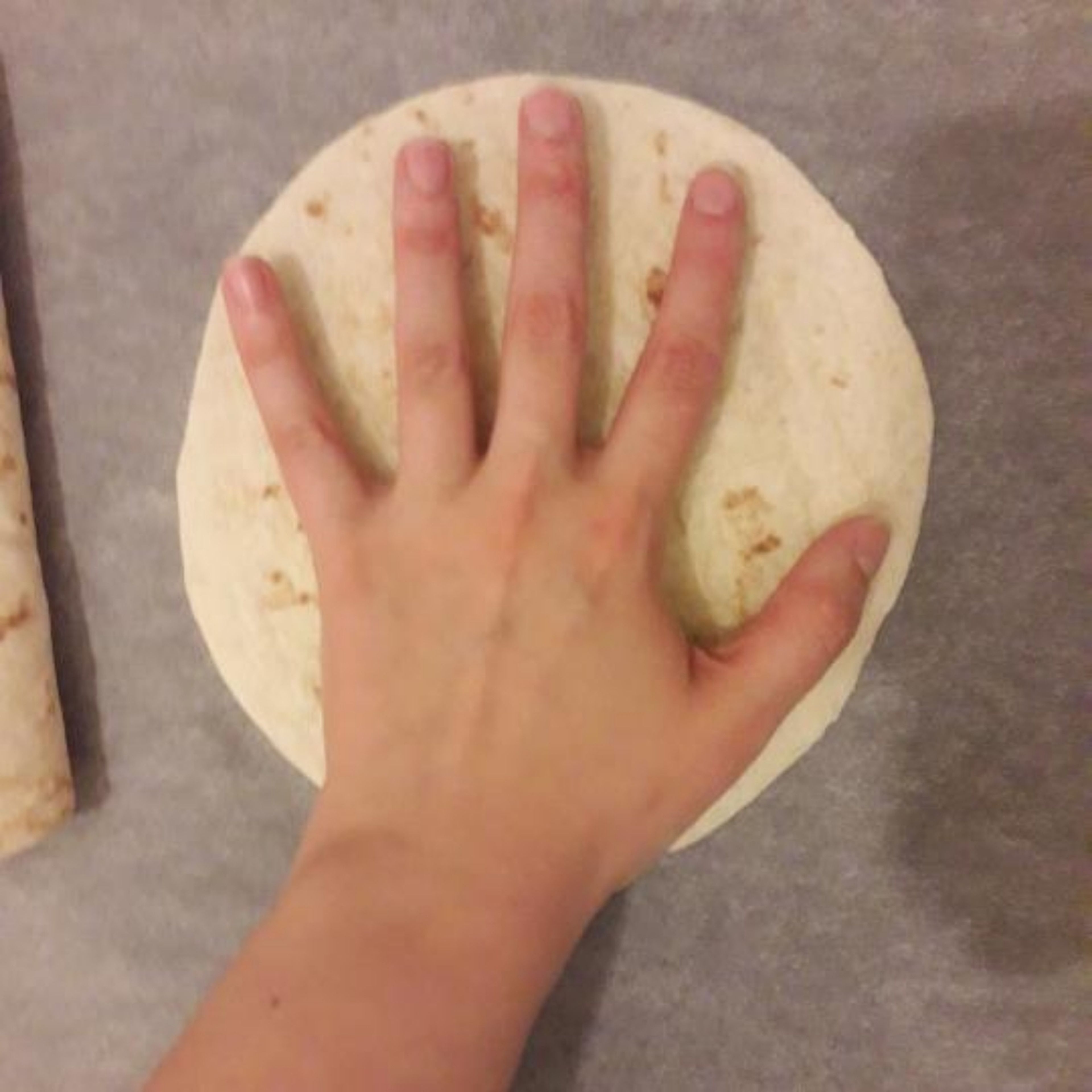 Take your flour/wheat tortillas and place them on the tray with baking parchment on it. Use as much tortillas as you wish, the written serving size is what I usually make for myself if I use the smaller ones (I forgot the exact size sorry).