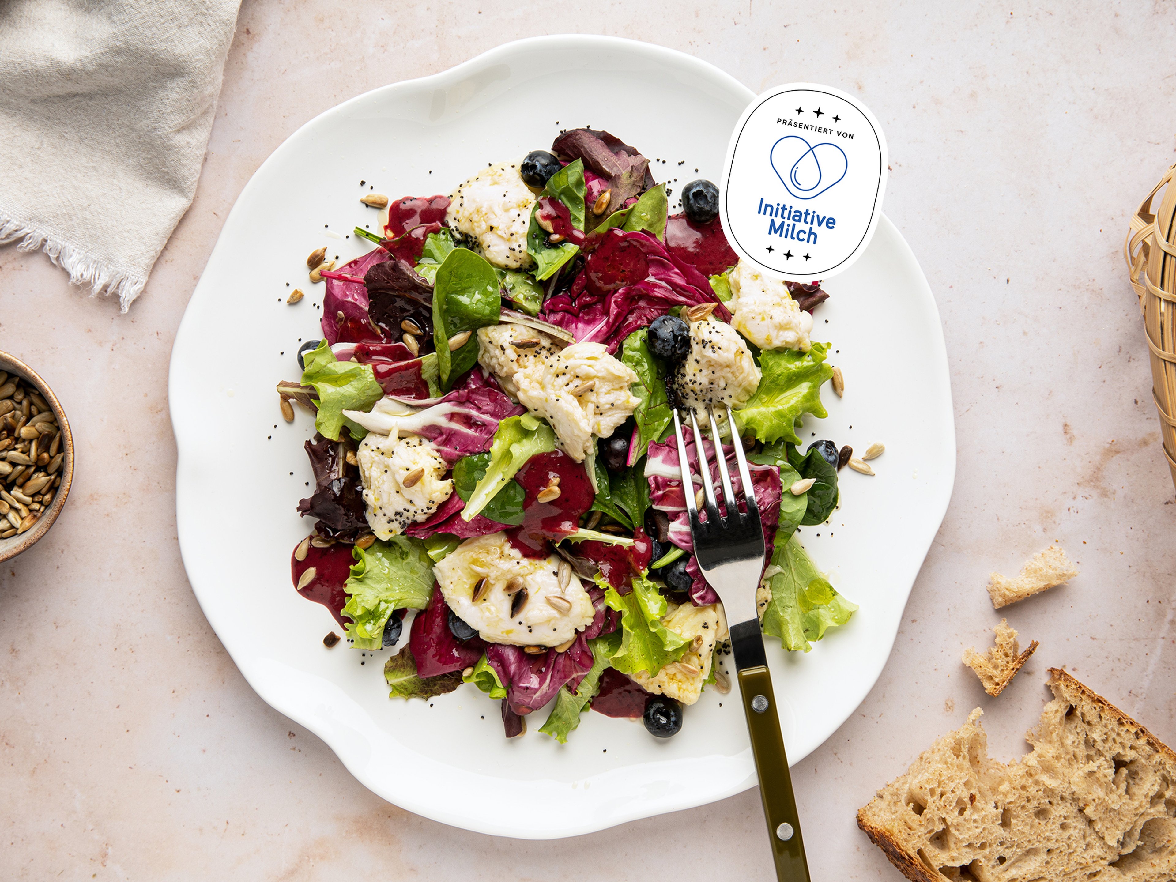 Summer lettuce blueberry salad with marinated mozzarella