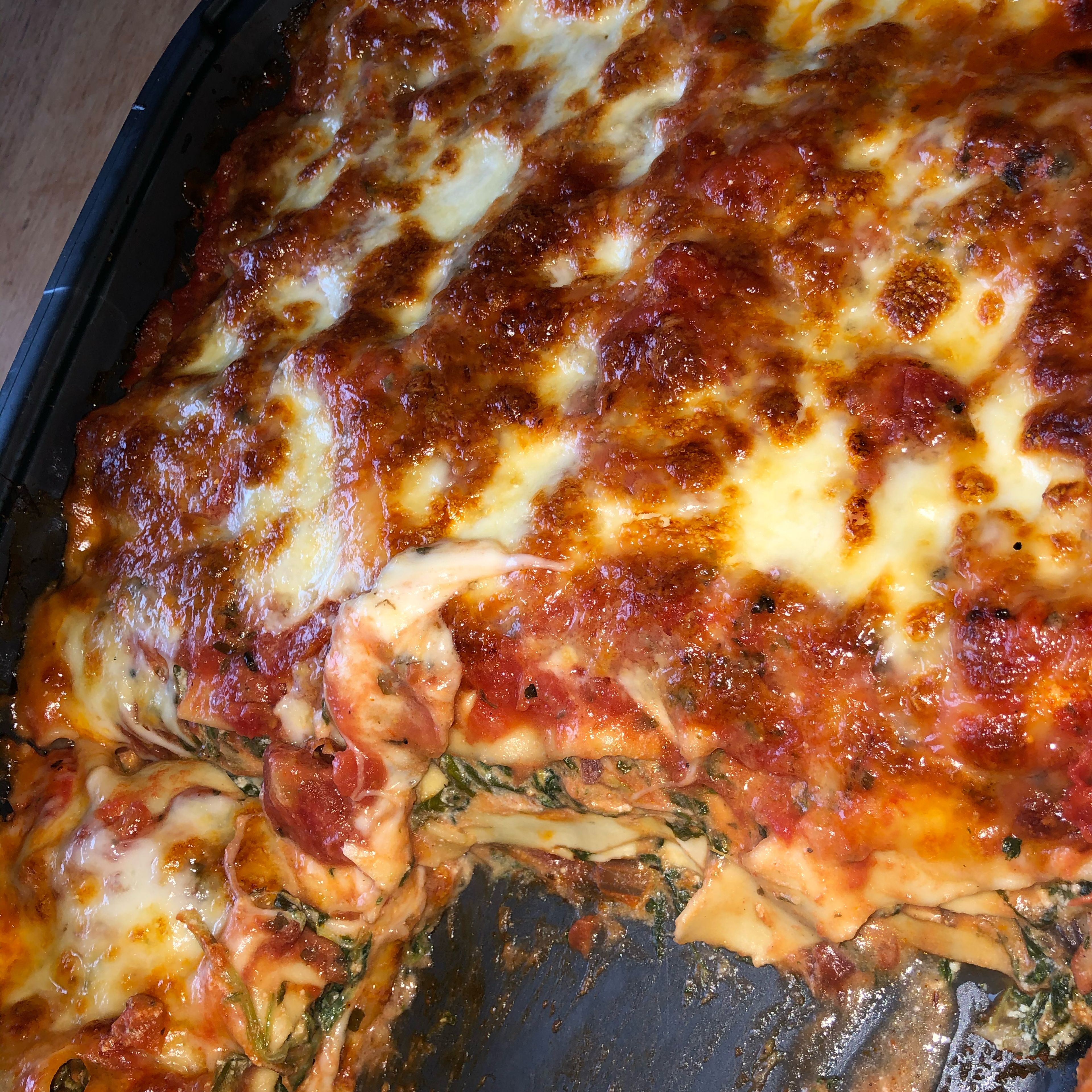 Vegetarian lasagna with spinach, mushrooms, and ricotta
