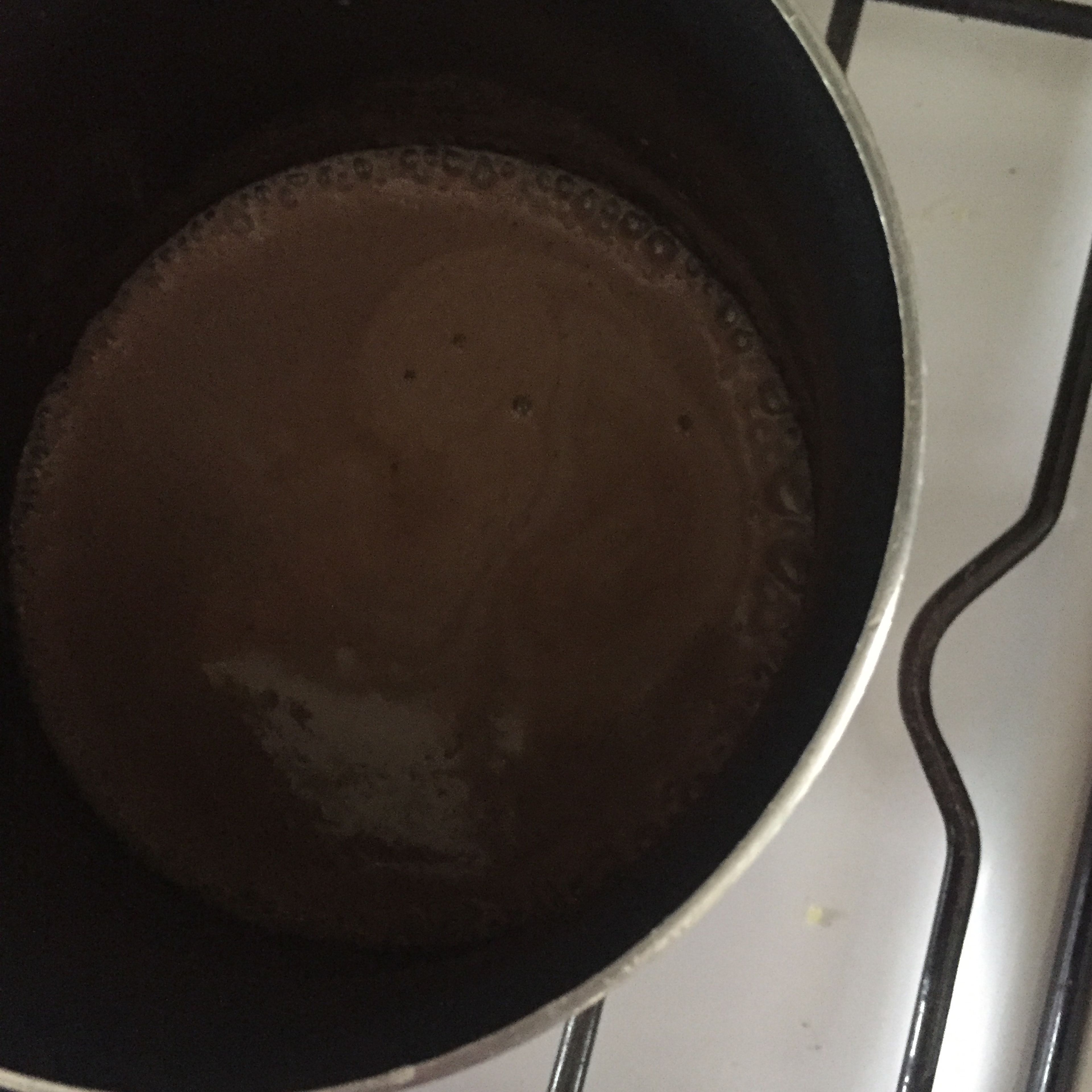 pour milk, and stir. Pour into a pot and heat until it boils. Keep stirring until it thickens a little bit.