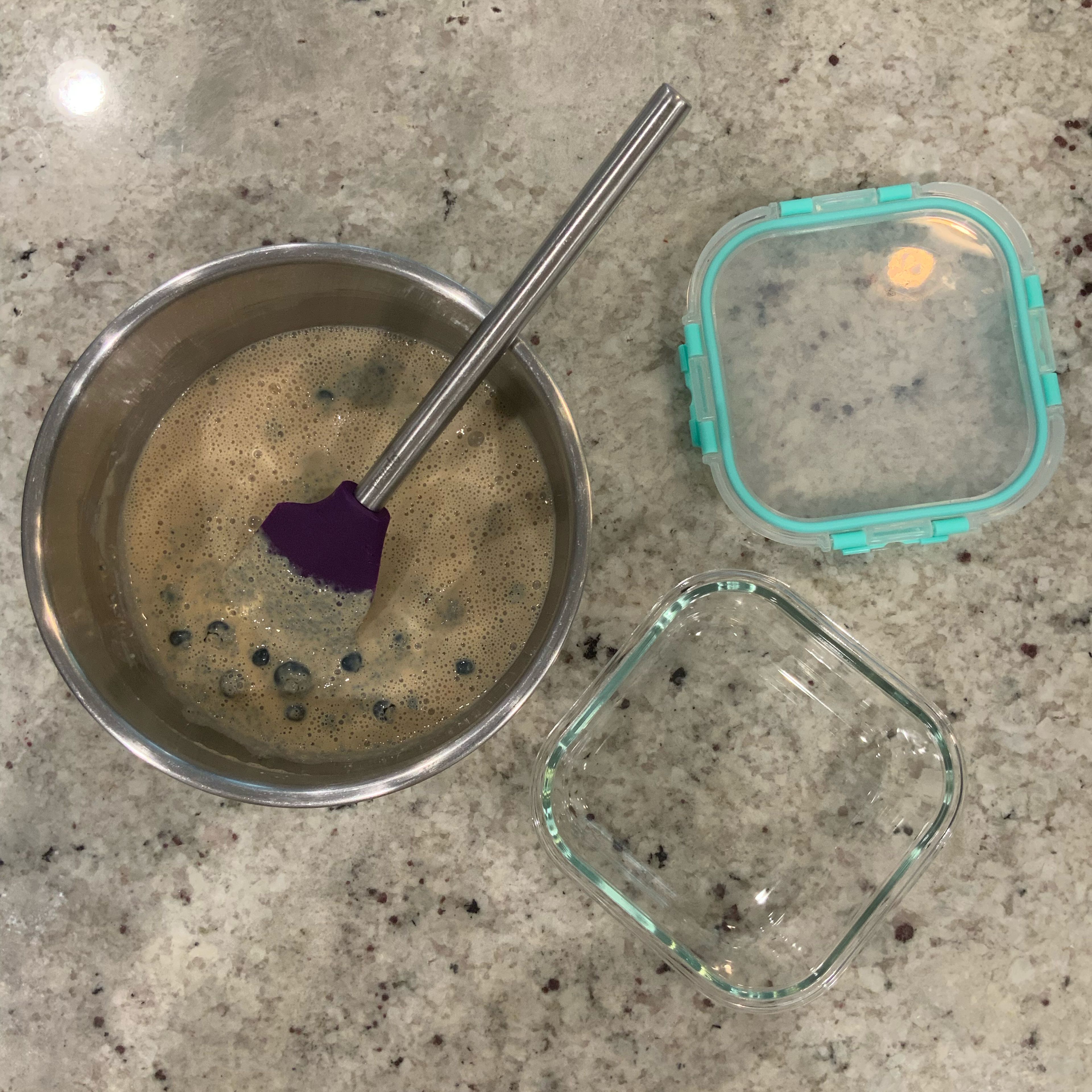 Use a spatula to mix in the whole blueberries, then transfer the mixture to an airtight container for storage in the fridge.