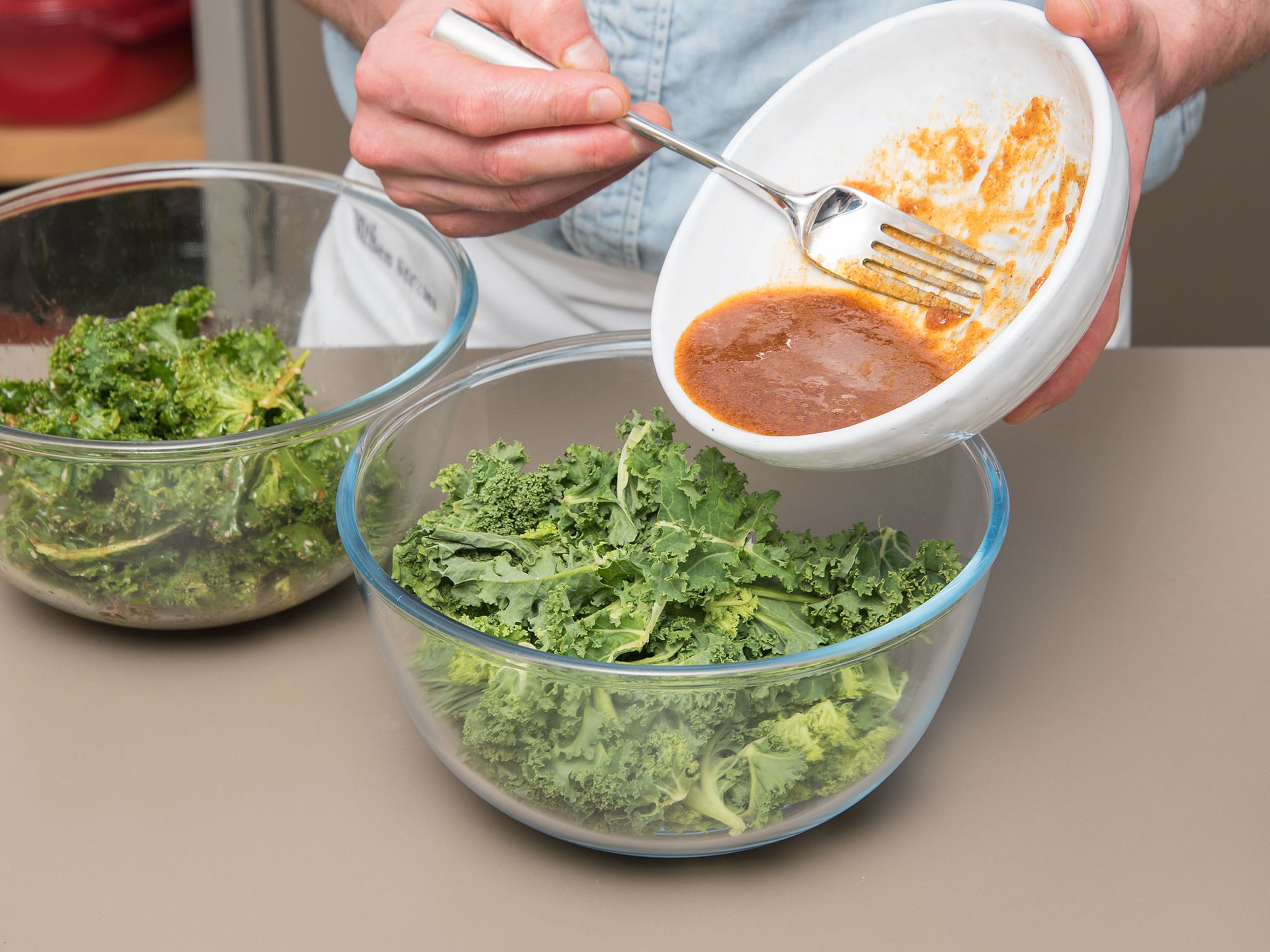 Remove kale leaves from stem, tear into bite-sized pieces, wash, and dry completely. Divide kale into two bowls, add one bowl of marinade to each, tossing until kale is fully and evenly coated.