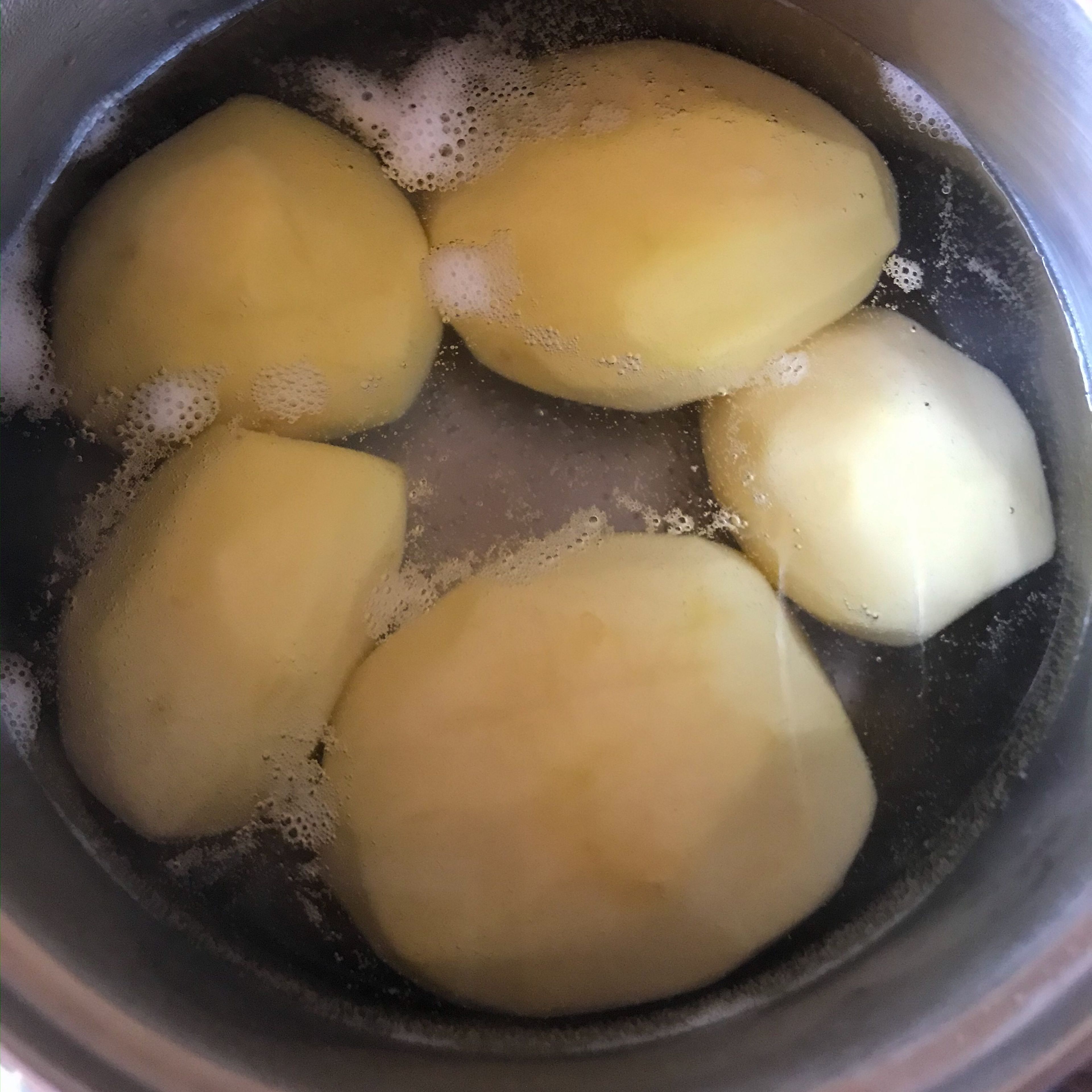 Boil the potatoes on hot water.