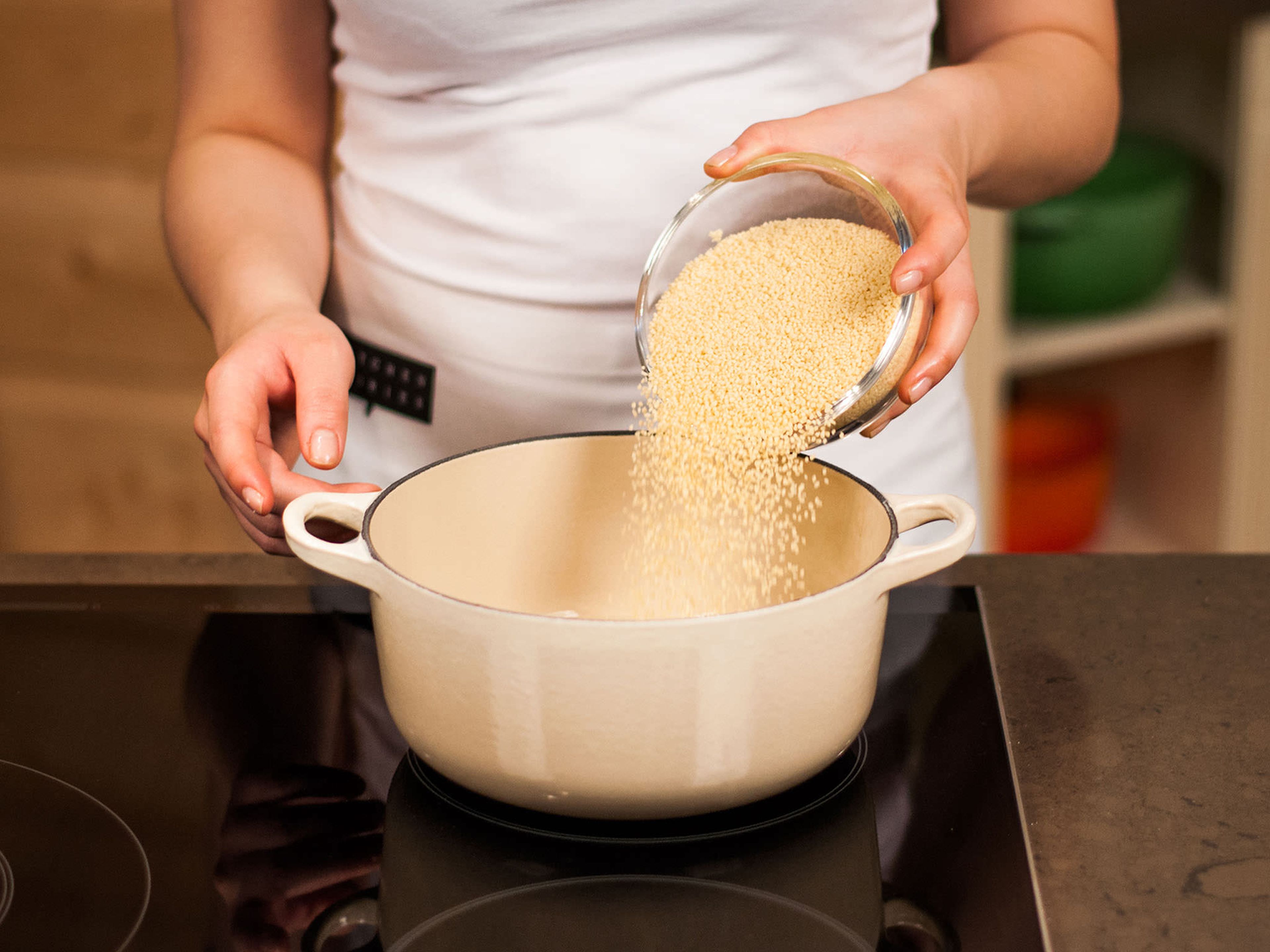 Allow couscous to stand and cook in boiled water according to package instructions and set aside.