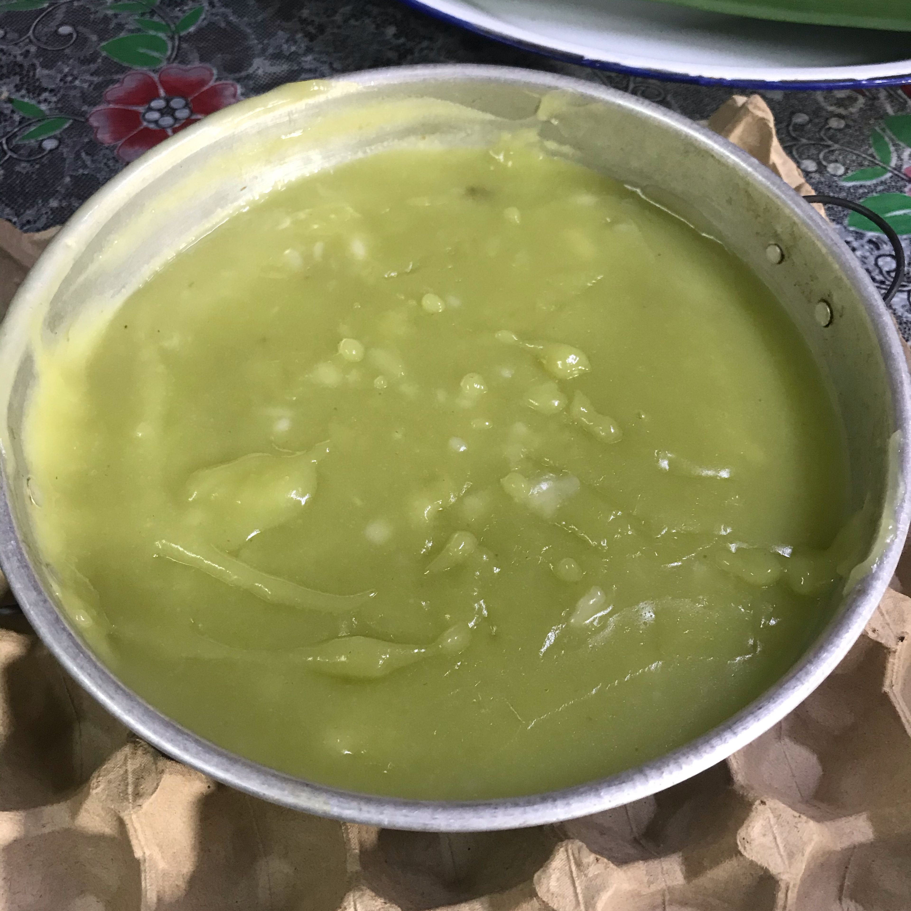 pour the pandan leaves water, sugar and flour on the wok and heat it up while stirring it until it becomes soupy. (make sure you don’t heat it too much) once done, pour the mixture into a cake pan