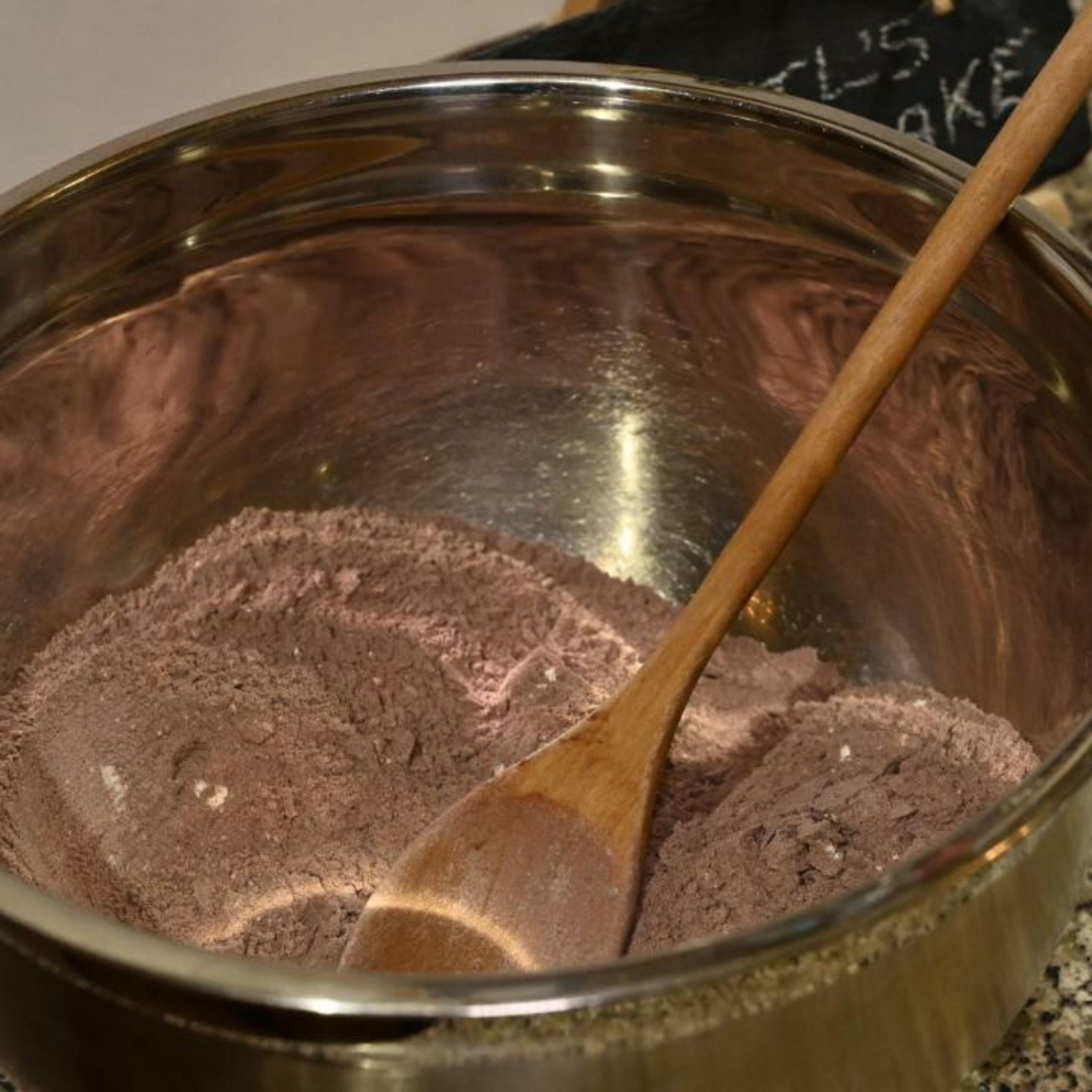 In a bowl mix together the baking powder, baking soda, cocoa powder and salt with the flour.