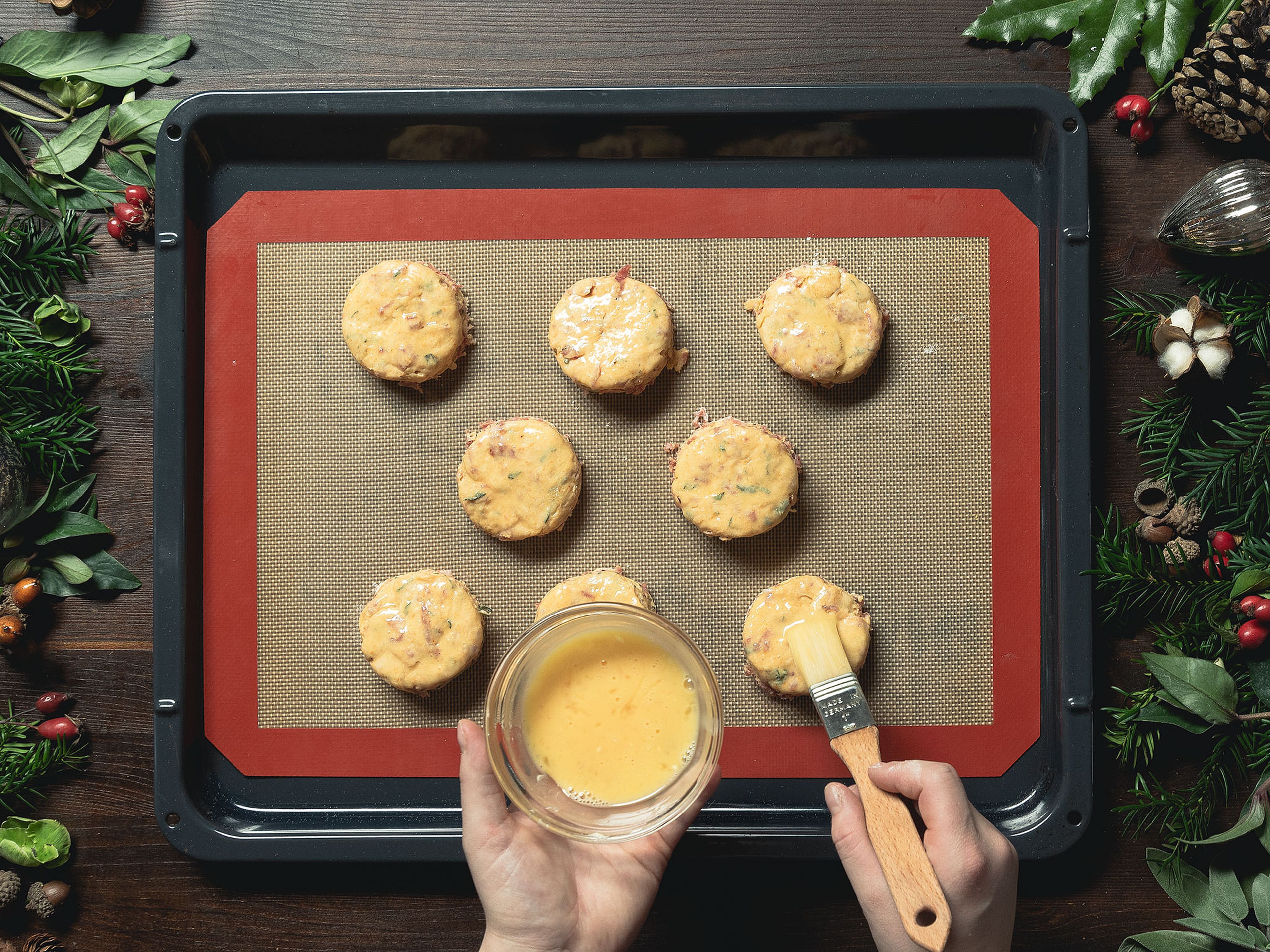 On a floured work surface, roll out the dough approx. 2.5 cm/1-in. thick and cut out circles. Transfer scones to a silicone baking mat-lined baking sheet. Whisk the egg in a small bowl and brush the scones with it. Bake at 200°C/395°C for approx. 15 min. or until golden brown. Serve with butter and enjoy!