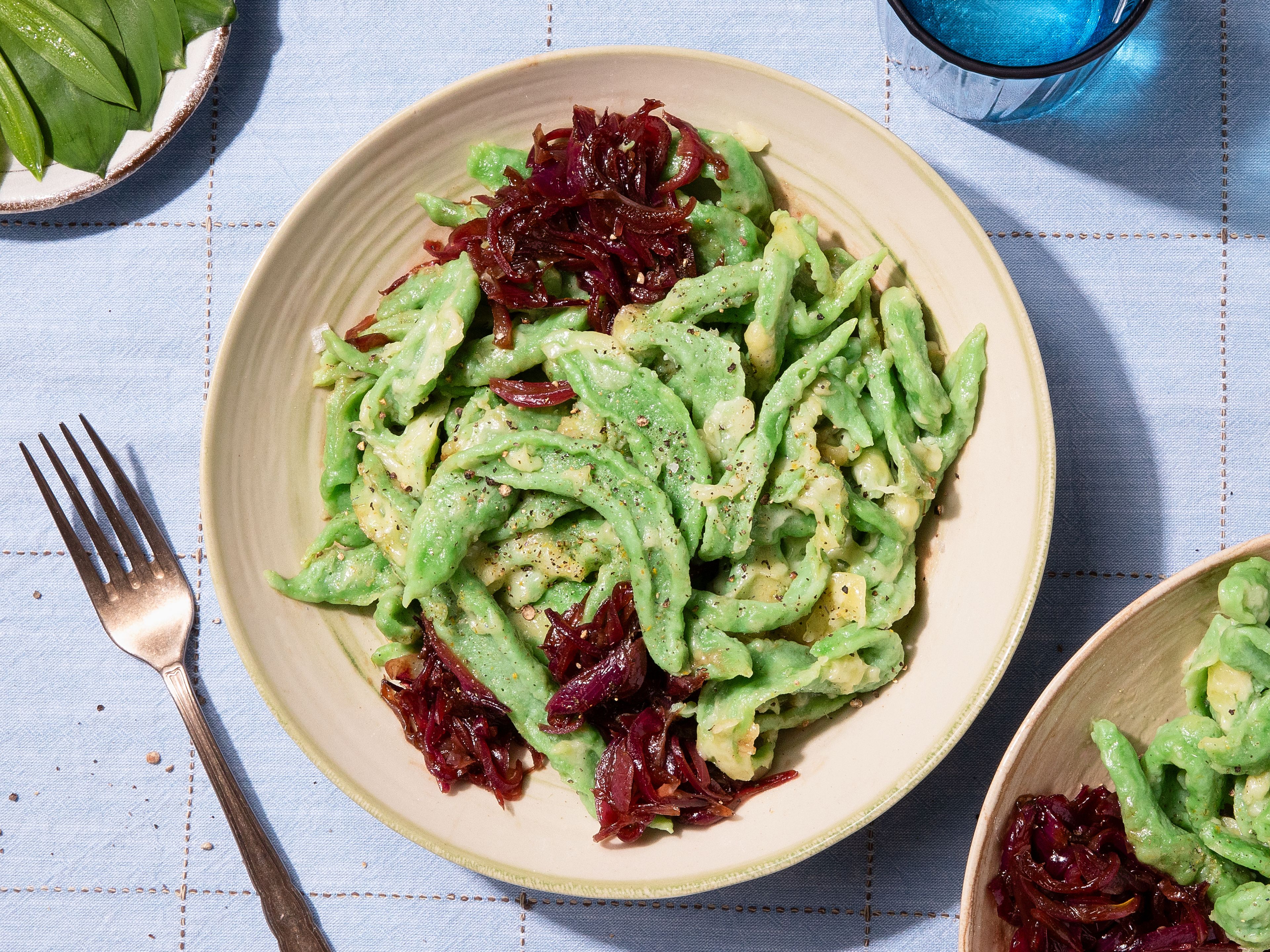Wild garlic Spätzle with cheese and caramelized onions