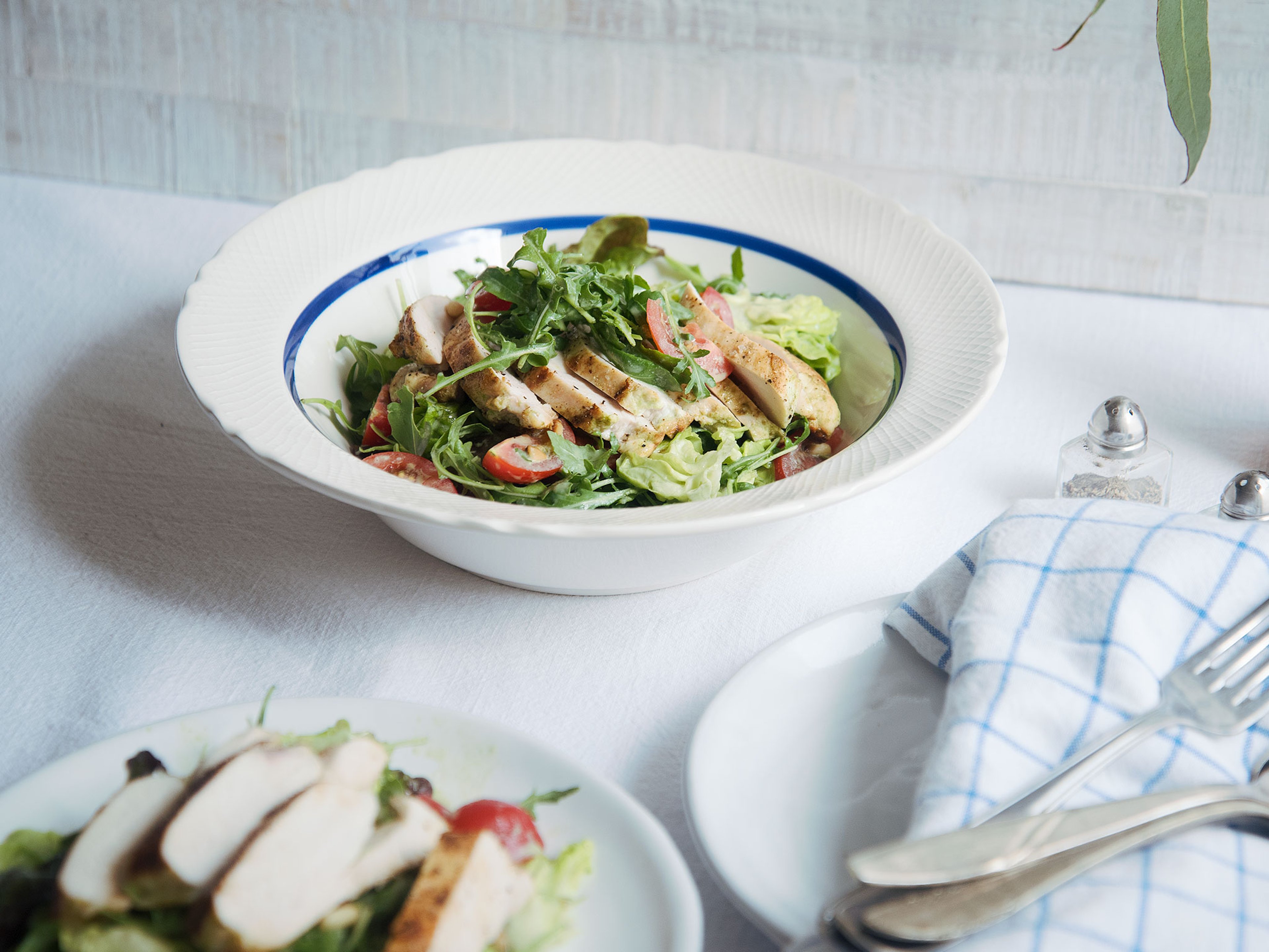 Green goddess buttermilk chicken over salad