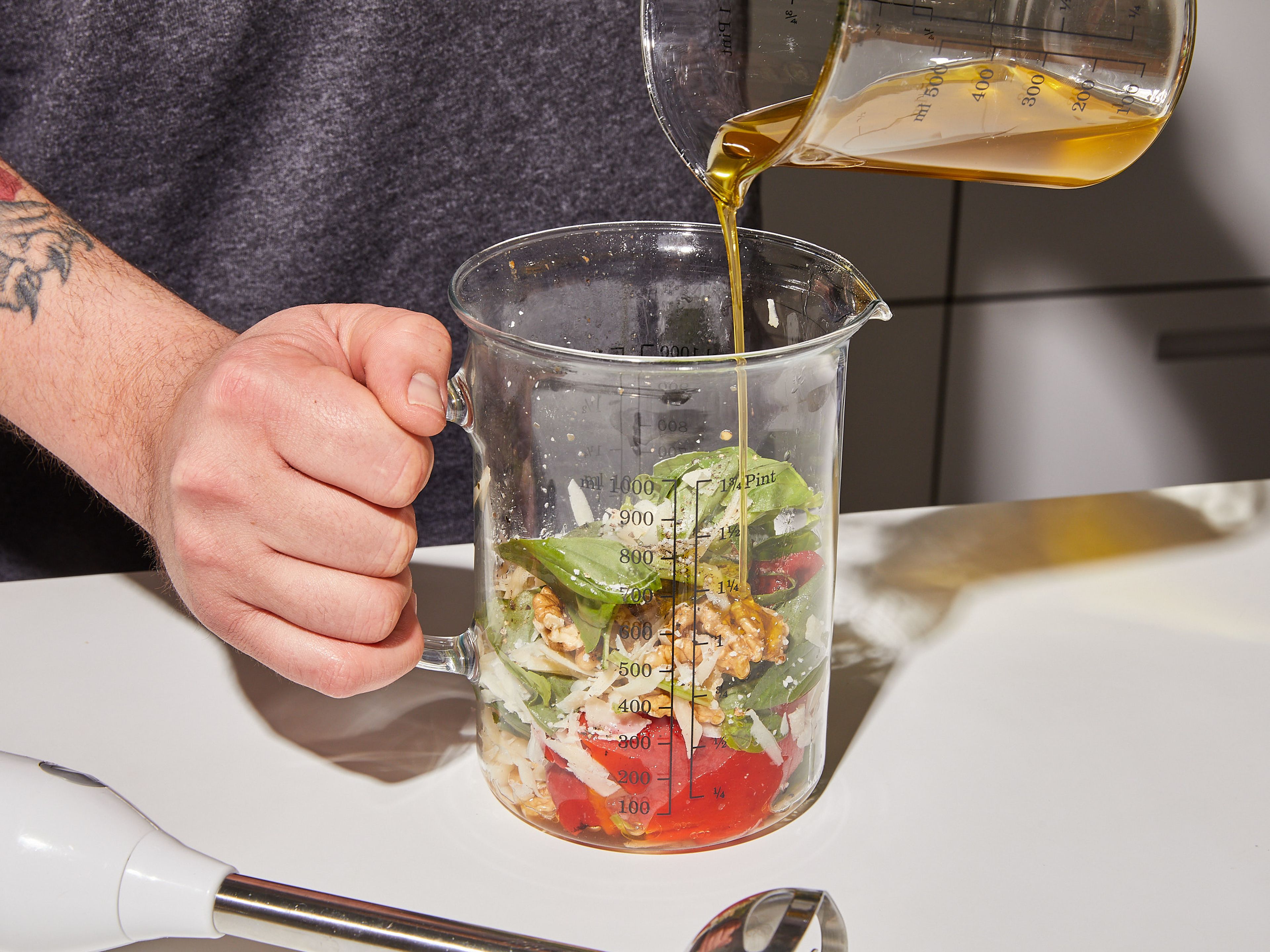 Add all ingredients to a large measuring cup,  use an immersion blender to blend until very smooth and saucy. Add lemon juice to taste, and season with salt and pepper.