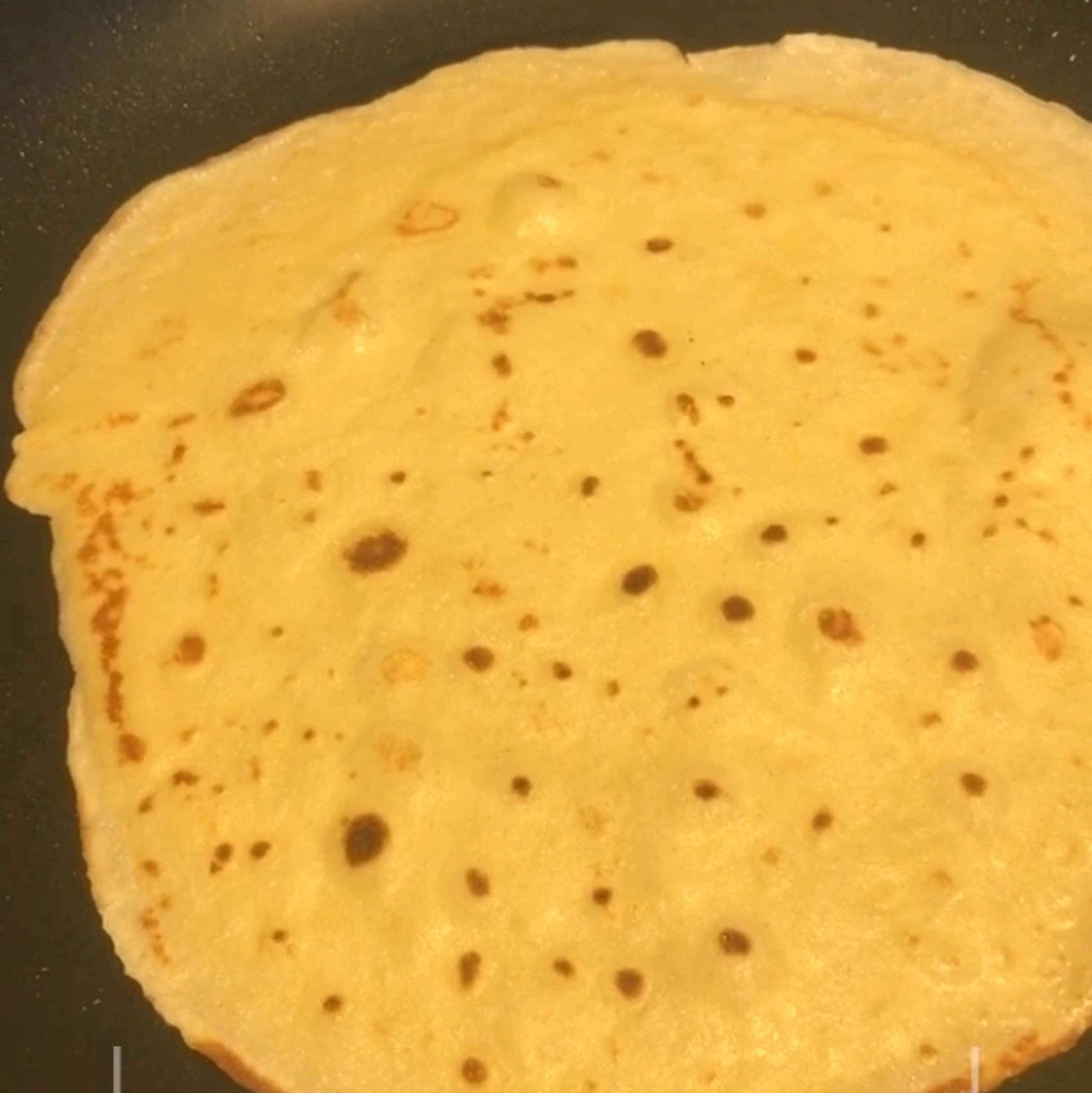 Cook the pancake for about 1-2 minutes, until the bottom is light brown. Loosen with a spatula, turn and cook the other side. Serve hot.