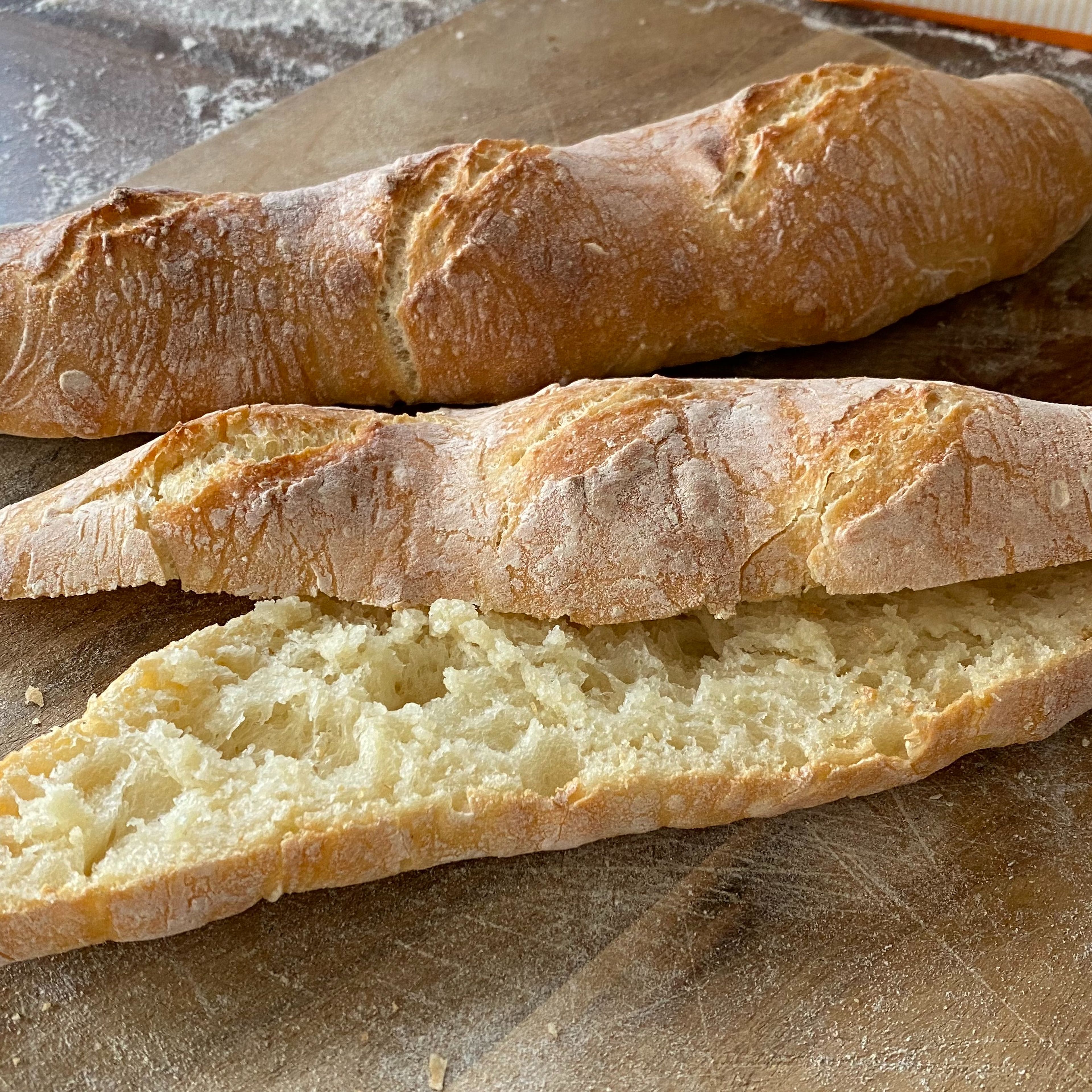 Take the baguettes out of the oven wrap in a kitchen towel let it sit for 5 minutes so the bread becomes a bit softer and easier to chew. Bon appétit