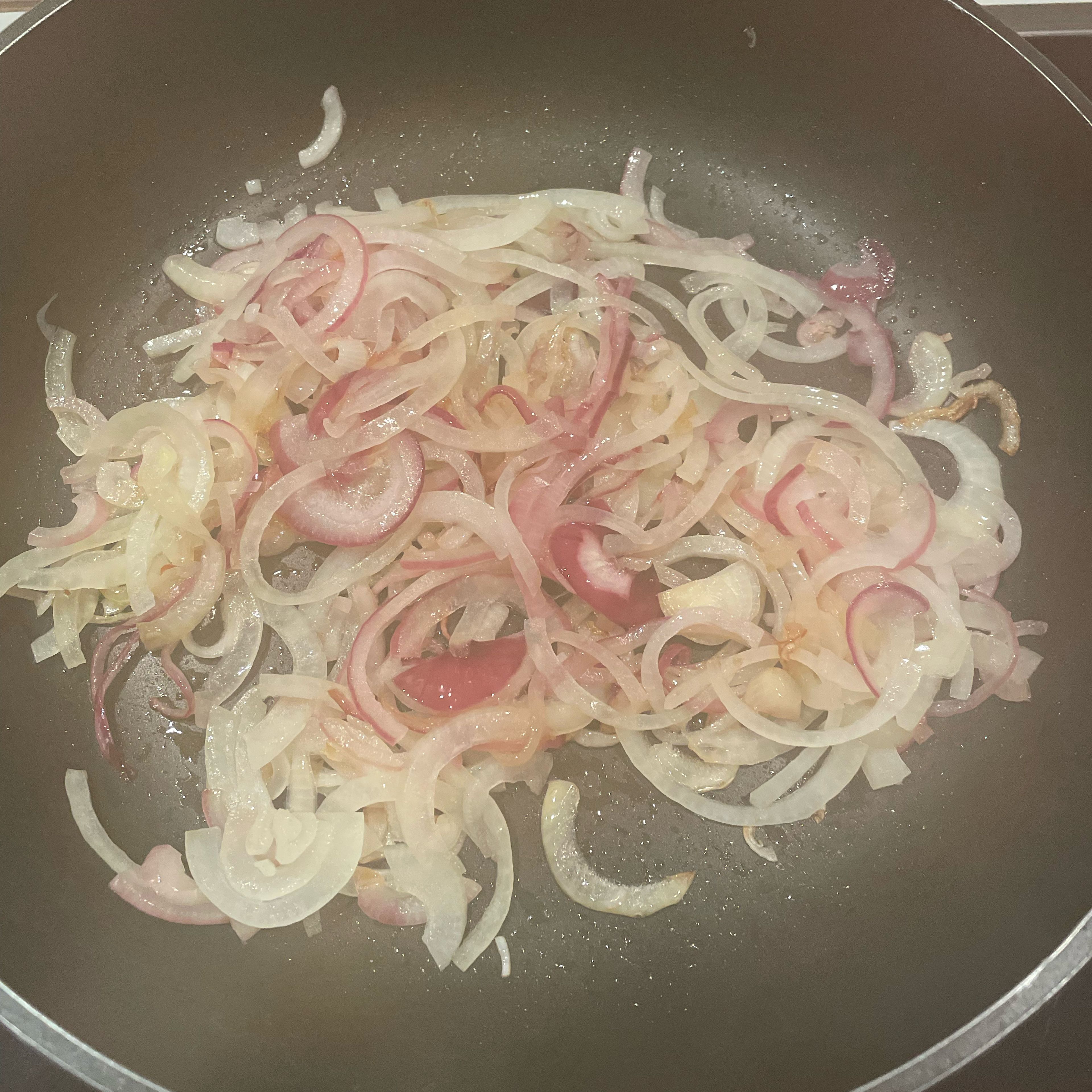 Heat the ghee in a pan and fry onions until crisp and set aside.