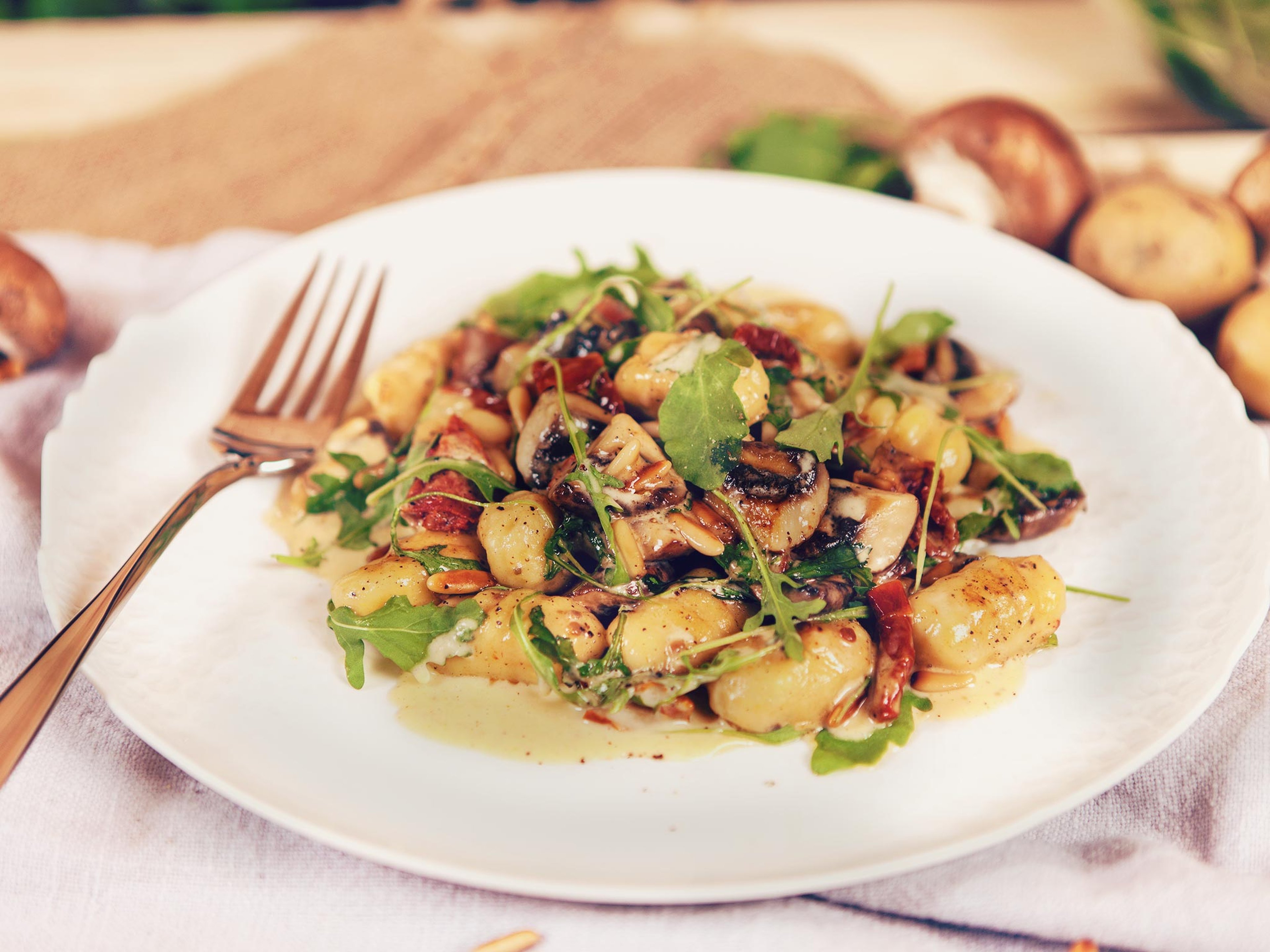 Homemade gnocchi with mushroom sauce