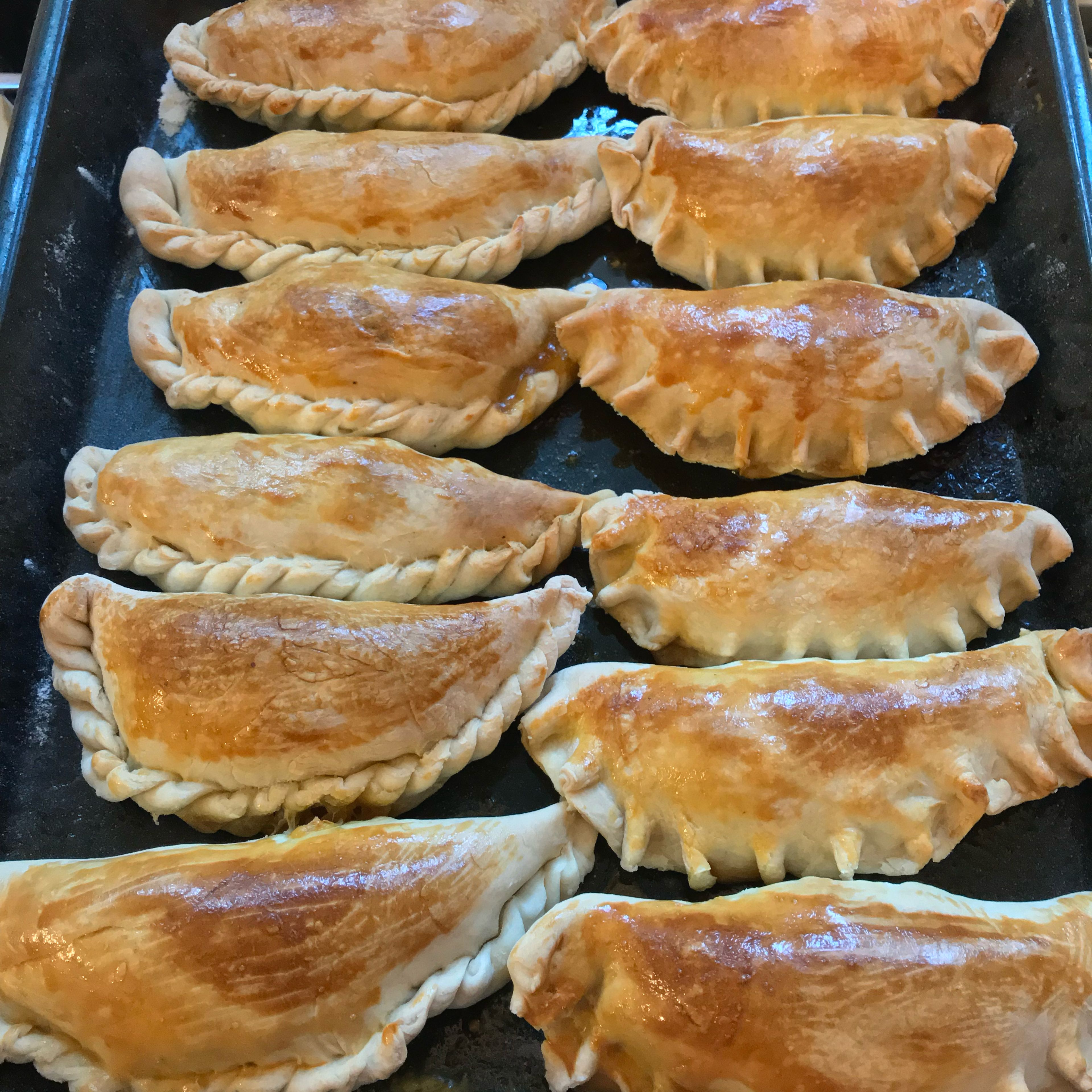 Baked Empanadas: Remove the chilled empanadas from the fridge and paint with egg. Bake in oven at 400 degrees for 20 to 25 minutes or until the empanadas are a light golden brown.