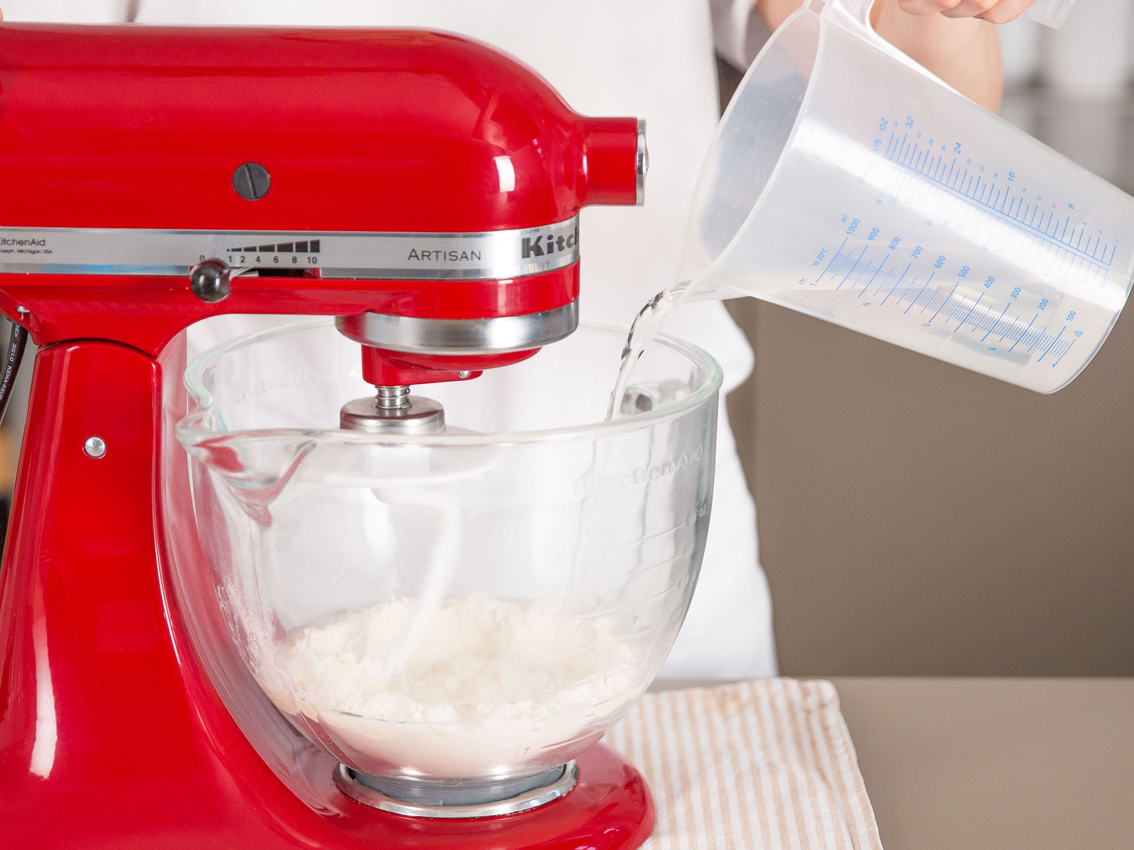 Add the flour and water to stand mixer and beat for approx. 2 – 3 min. until ingredients are well incorporated.