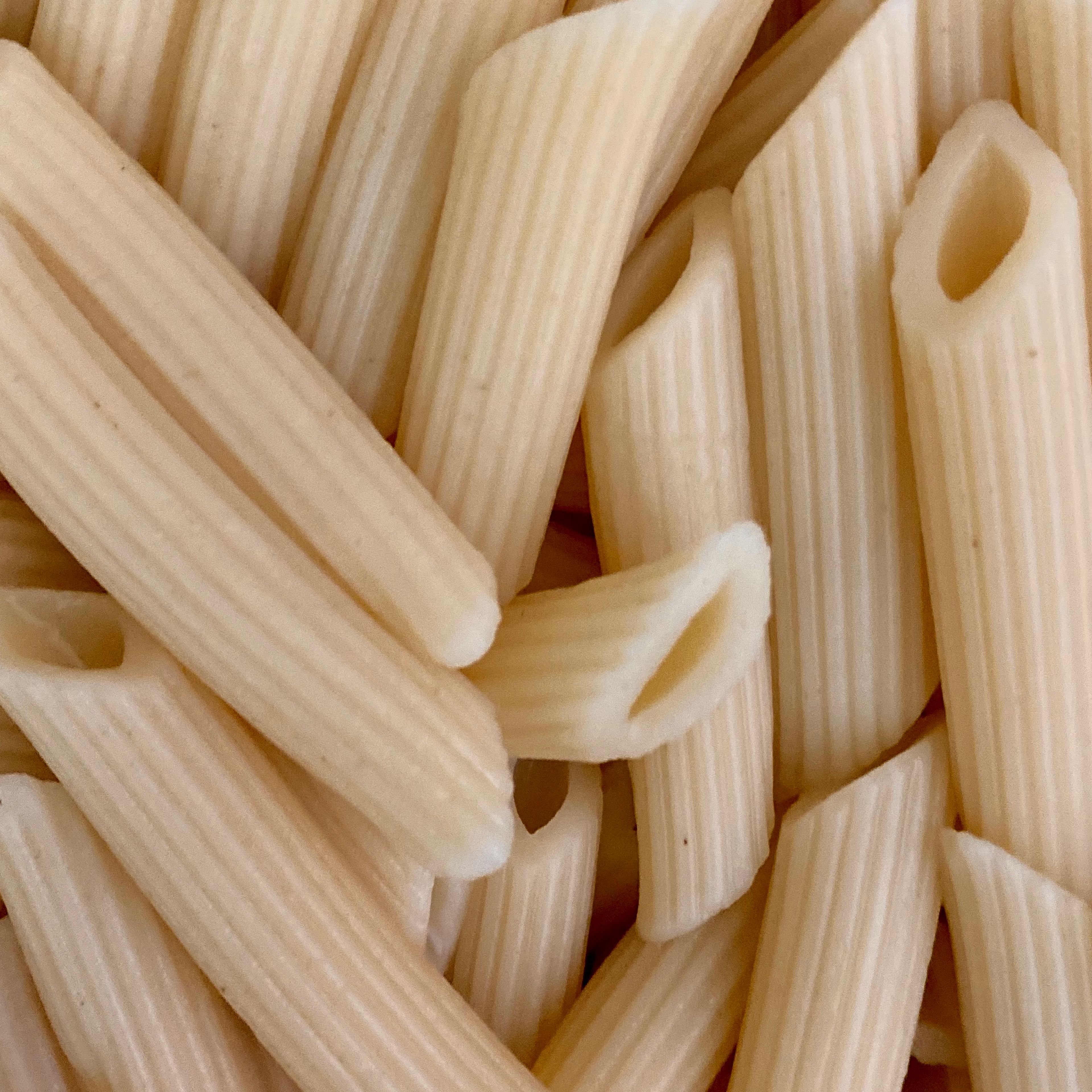 Bring water to boil and pinch of salt. Cook your pasta at around 10 - 13 minutes. Drain under cold water to stop the cooking process. Put aside with a good splash of olive oil, this will keep the pasta non sticky.