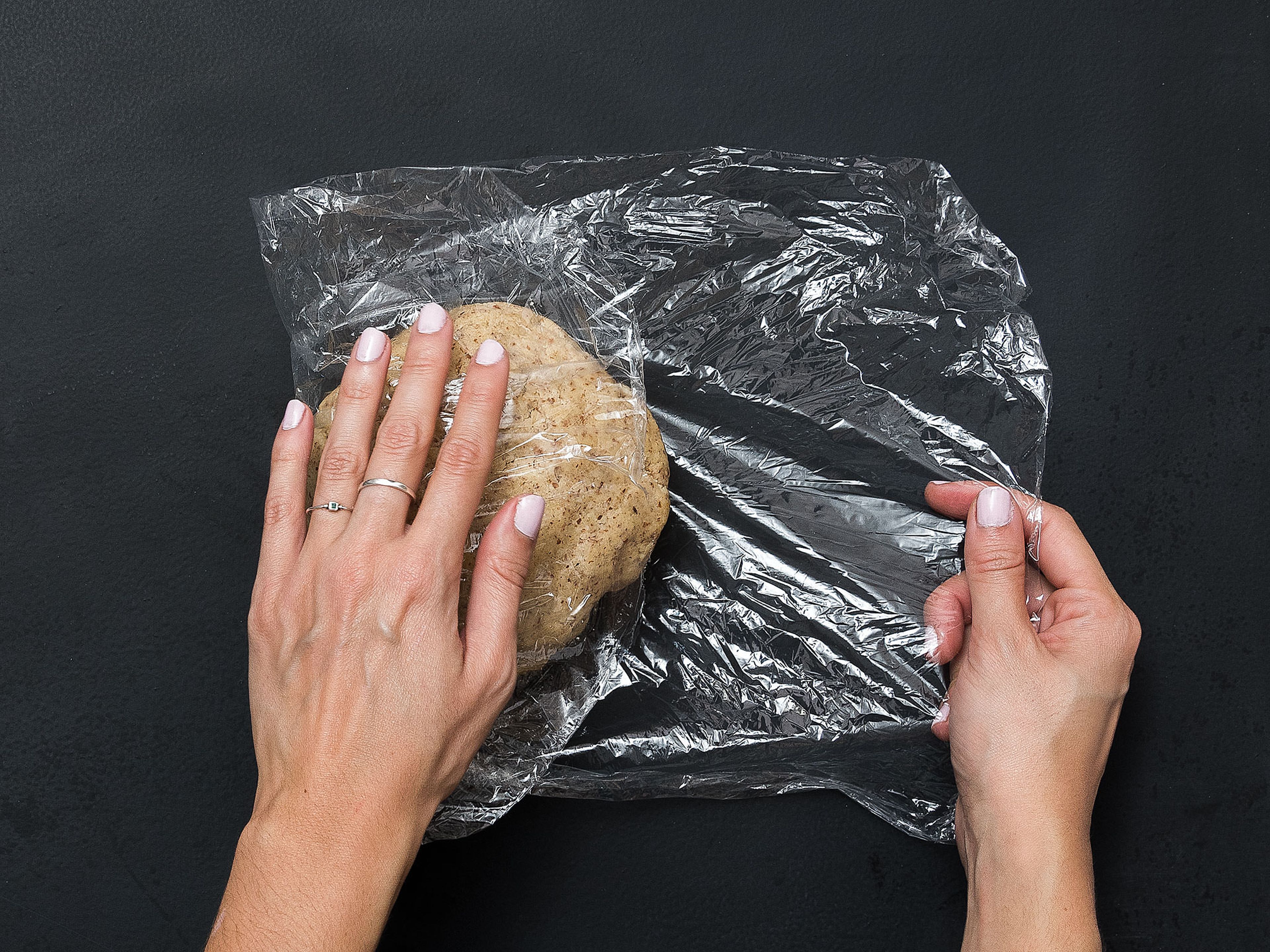 Form dough into a ball, wrap in plastic wrap, and place in the fridge for approx. 30 min.