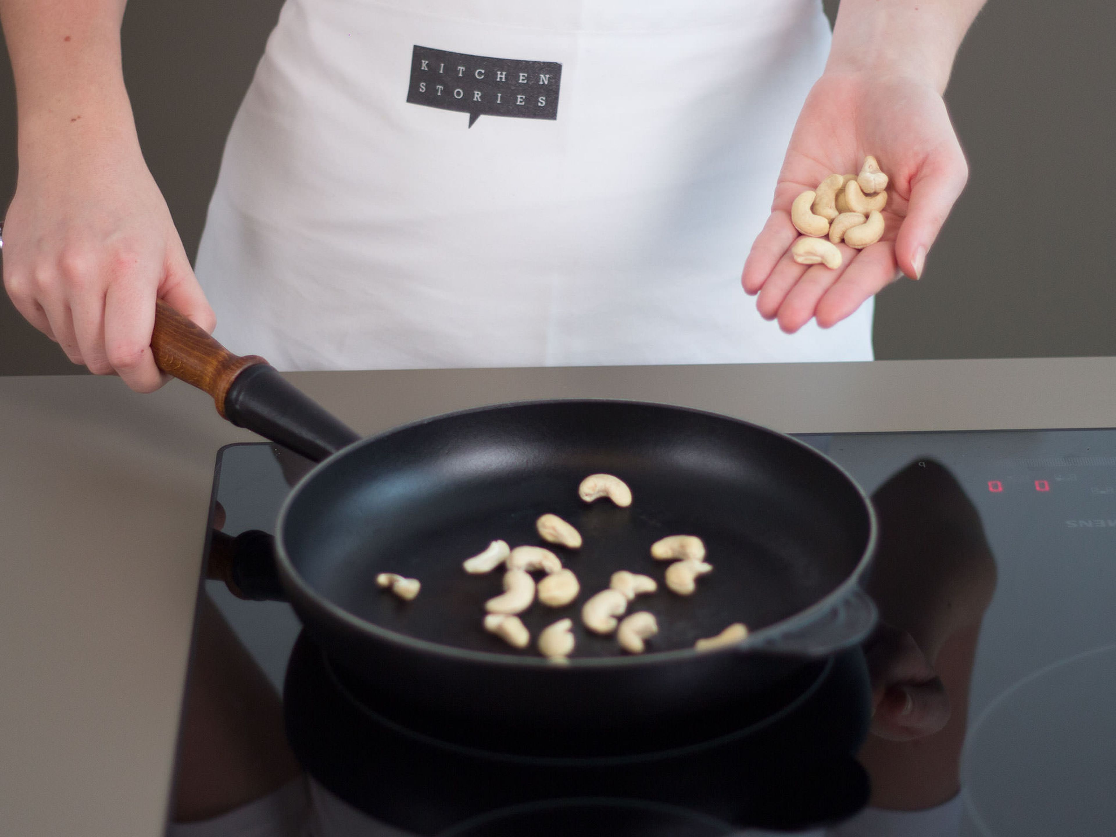 In a large, grease-free frying pan, toast cashews over medium-low heat for approx. 3 – 5 min. until fragrant and golden brown.