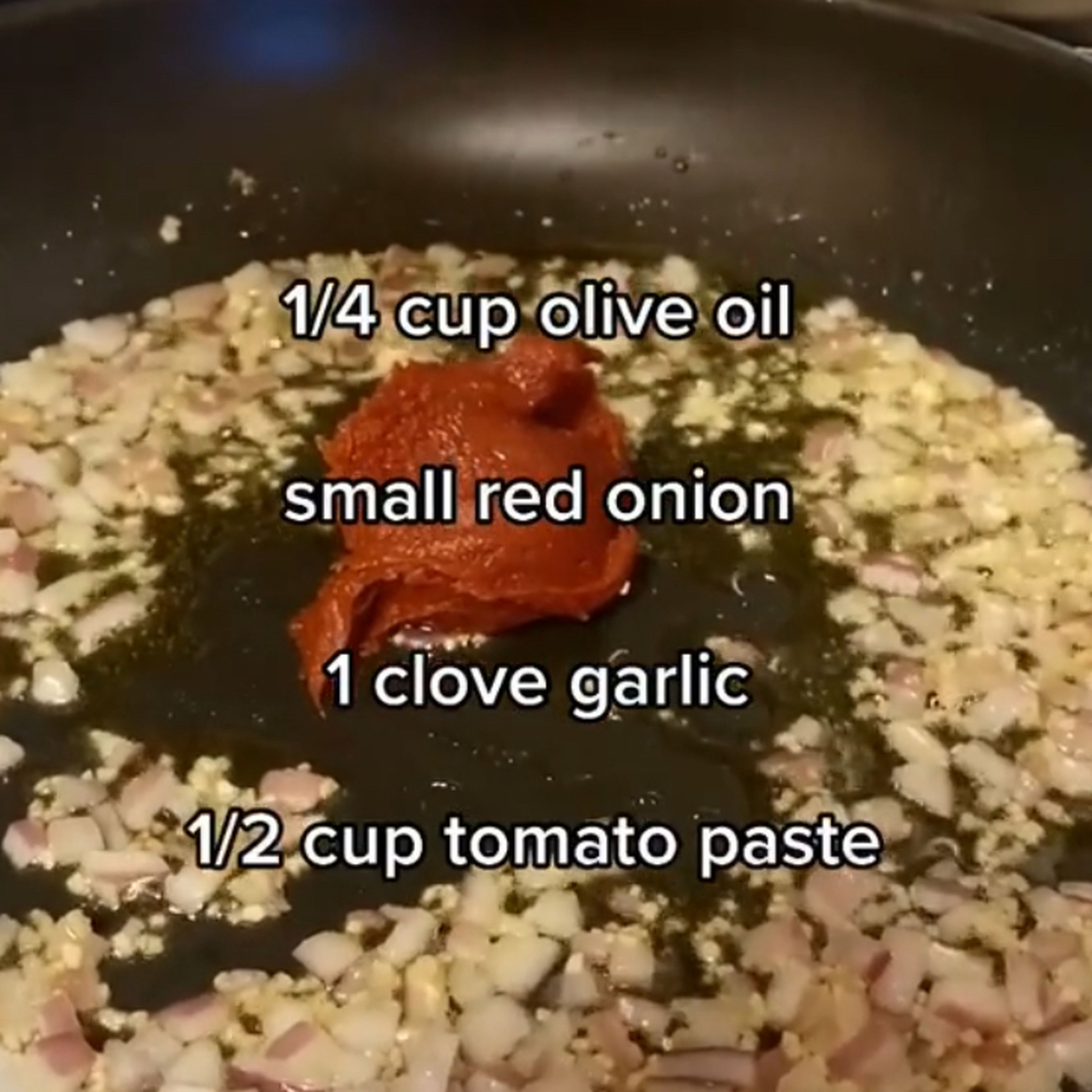 Add the tomato paste and mix.