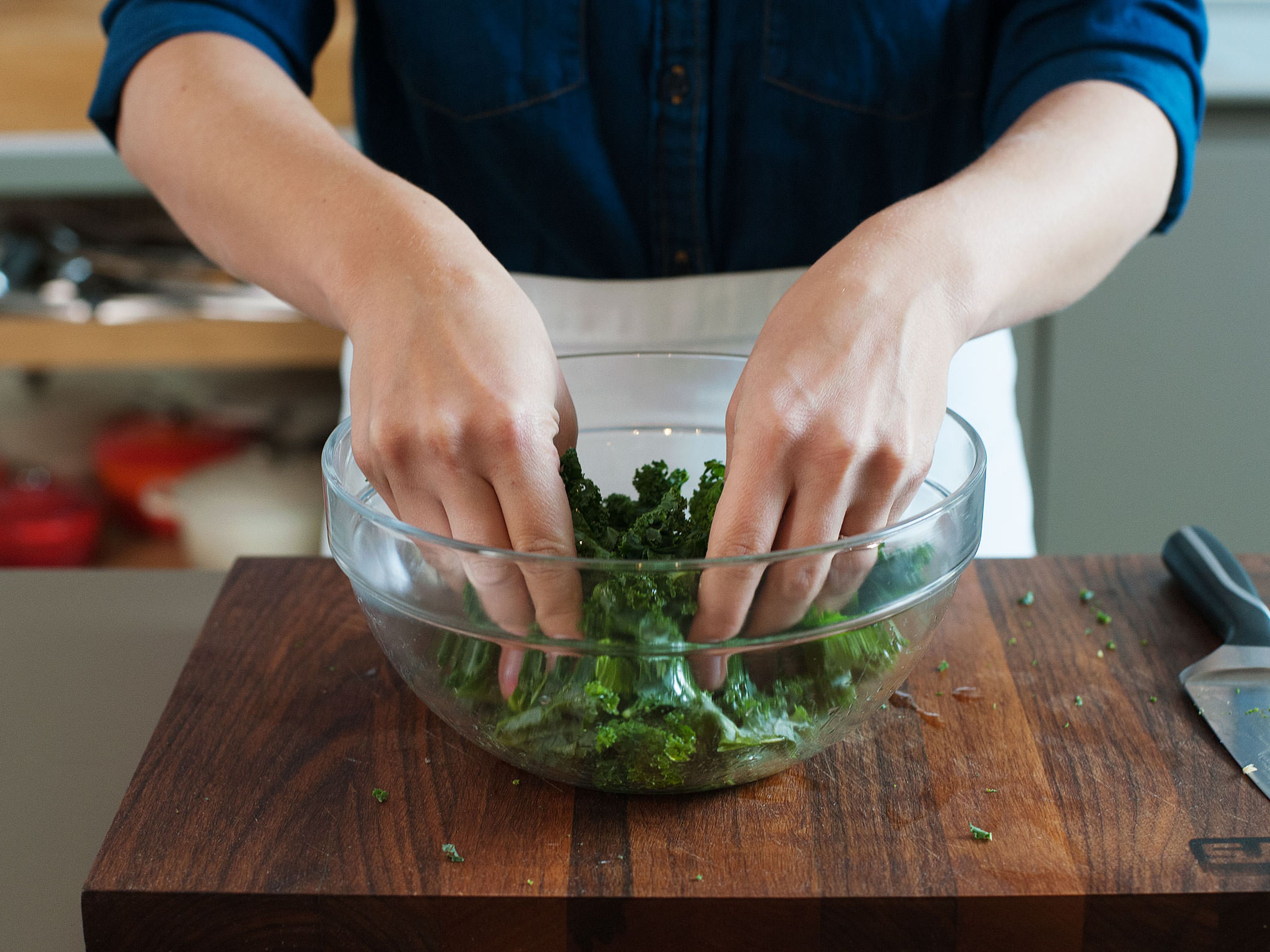 Remove stems from kale. Roughly chop or tear leaves with your hands. Transfer to a large mixing bowl along with some of the lemon juice and olive oil. Mix to coat and massage oil into kale to soften. Set aside.