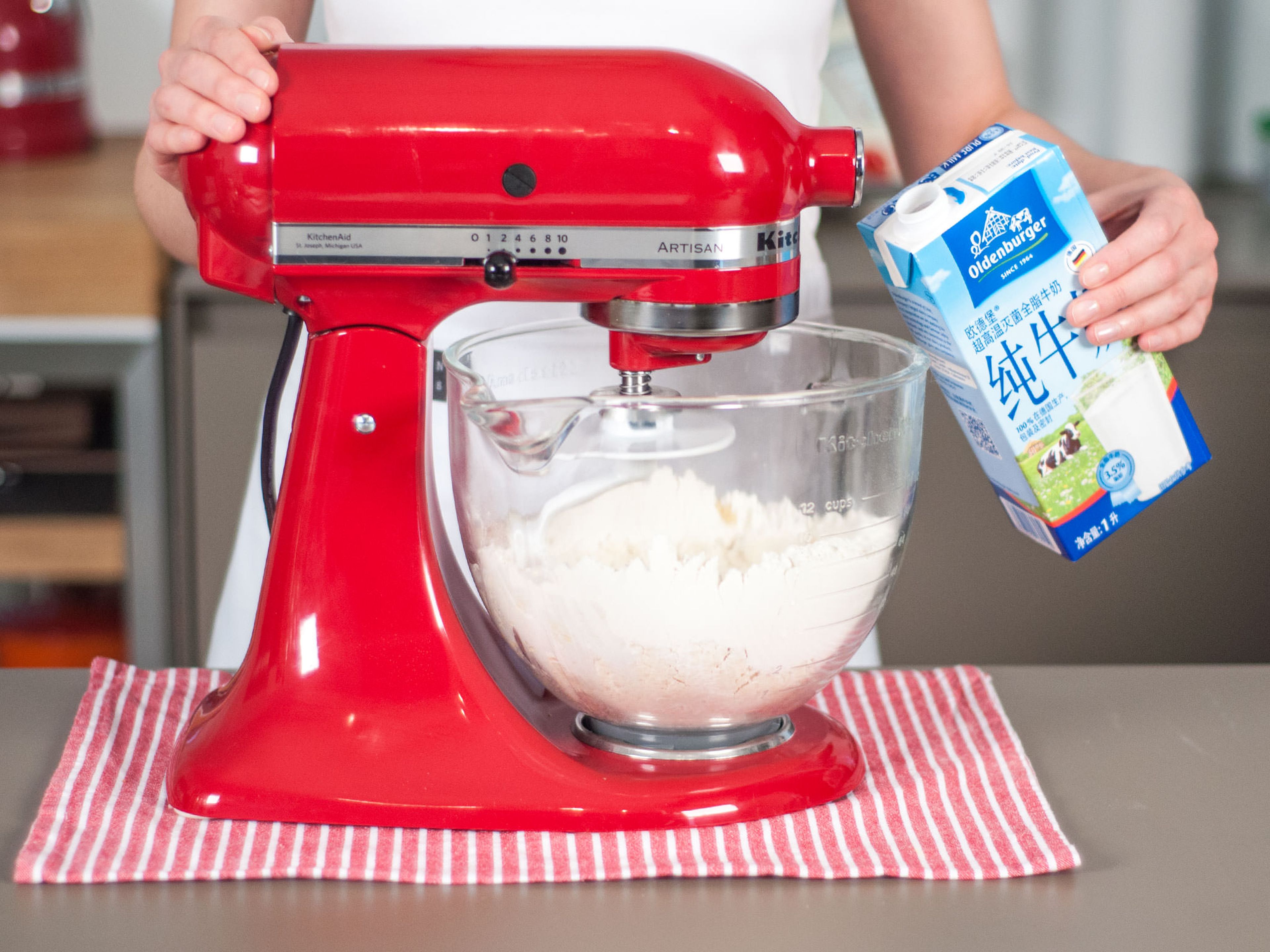 Combine flour, salt, and vegetable oil using a stand mixer with a dough hook. Gradually add milk and beat until incorporated. Continue to knead by hand until a smooth, elastic dough forms. Cover with plastic wrap, transfer to fridge, and allow to set for approx. 30 - 40 min.
