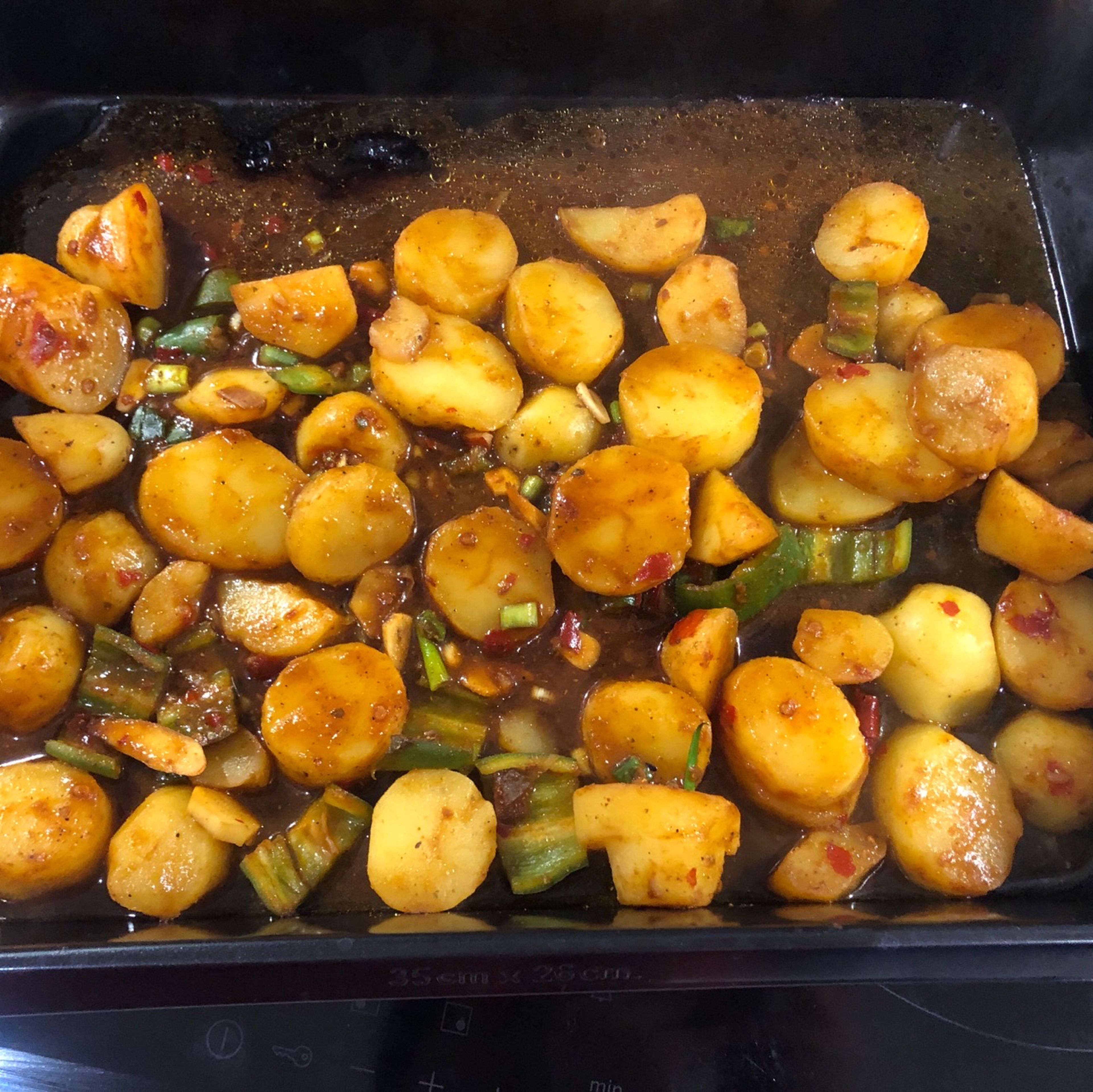 Roast curry golden potatoes