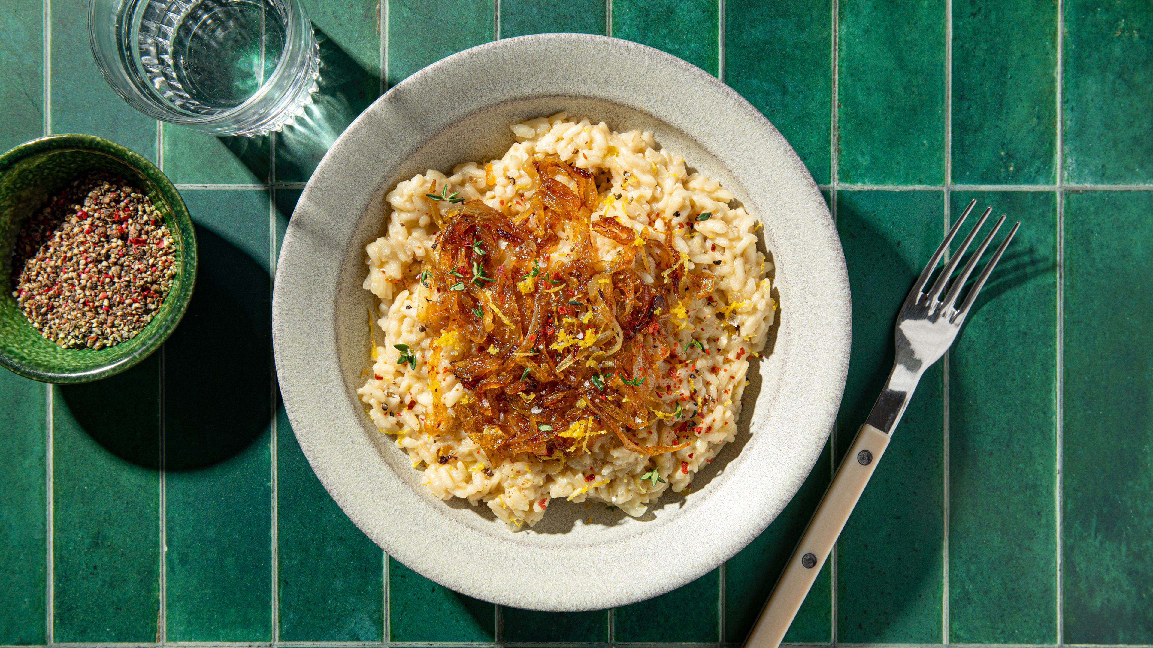 Vegan risotto with caramelized onions