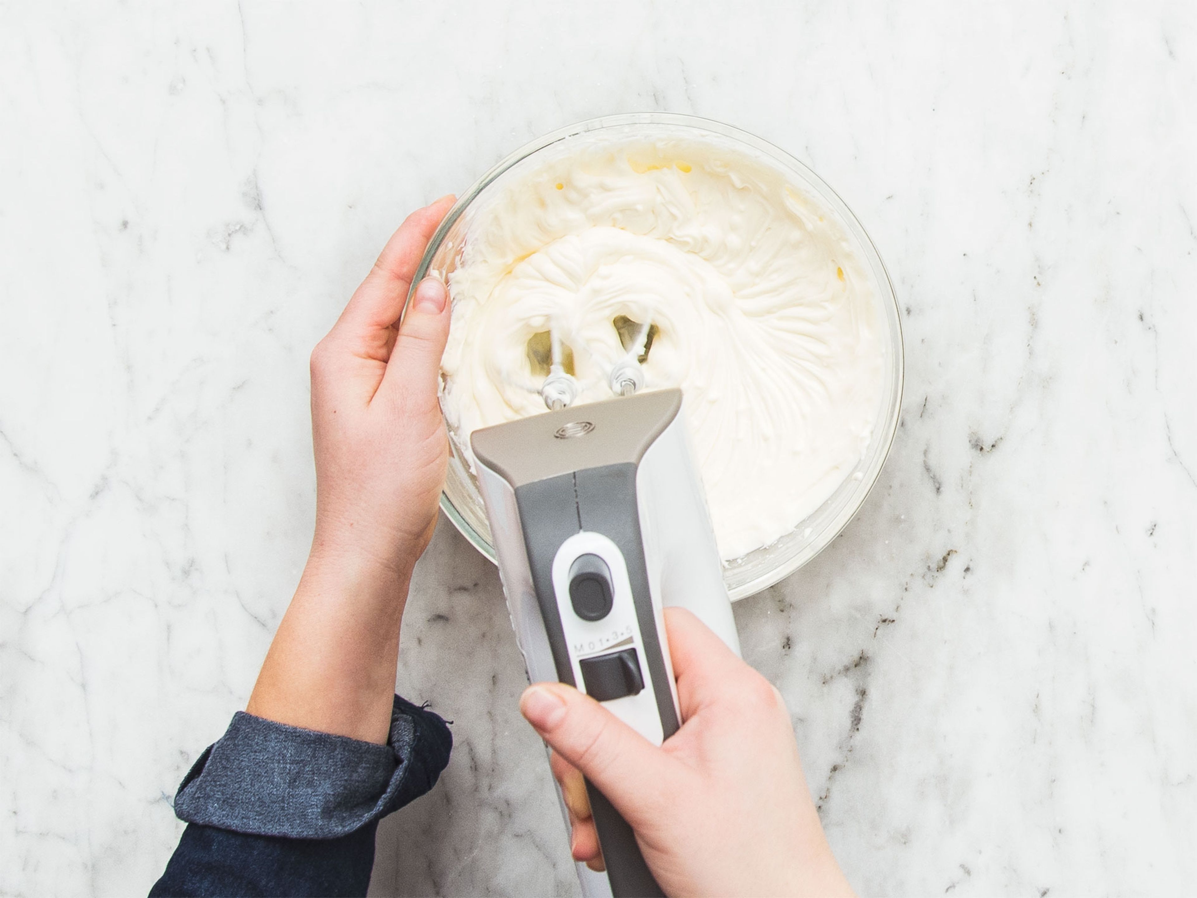 Add cream cheese, mascarpone cheese, confectioner’s sugar, and vanilla extract to a bowl and use a hand mixer with beaters to combine until creamy. Allow to cool in the fridge.