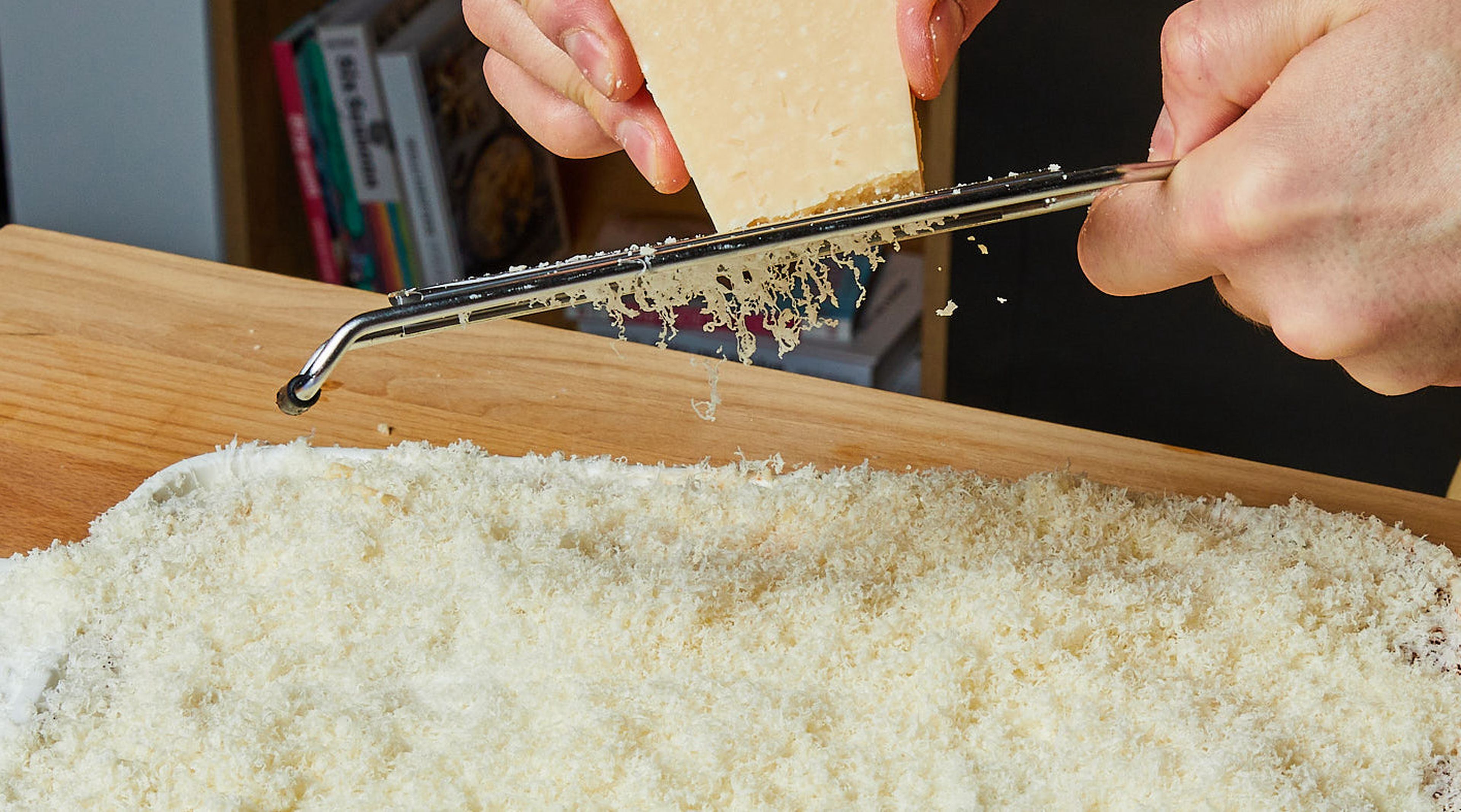 Grate Parmesan over the last layer, transfer lasagna to the air fryer and bake for approx. 30–35 min. on 180°C/356°, or until the top is golden. Serve in the hot air fryer dish.