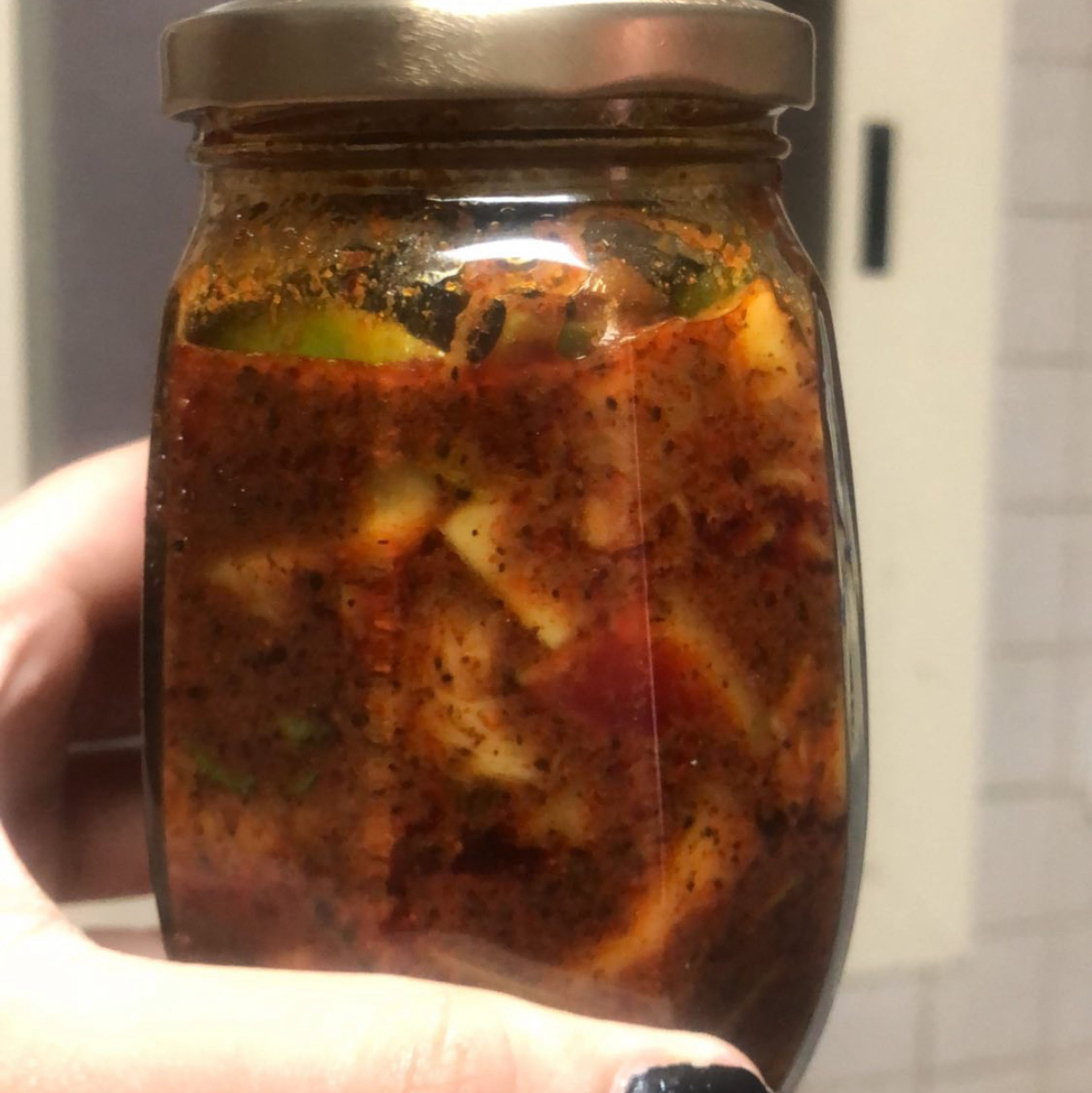 Store the mango pickle in an air tight container and make sure to consume it within 15 days