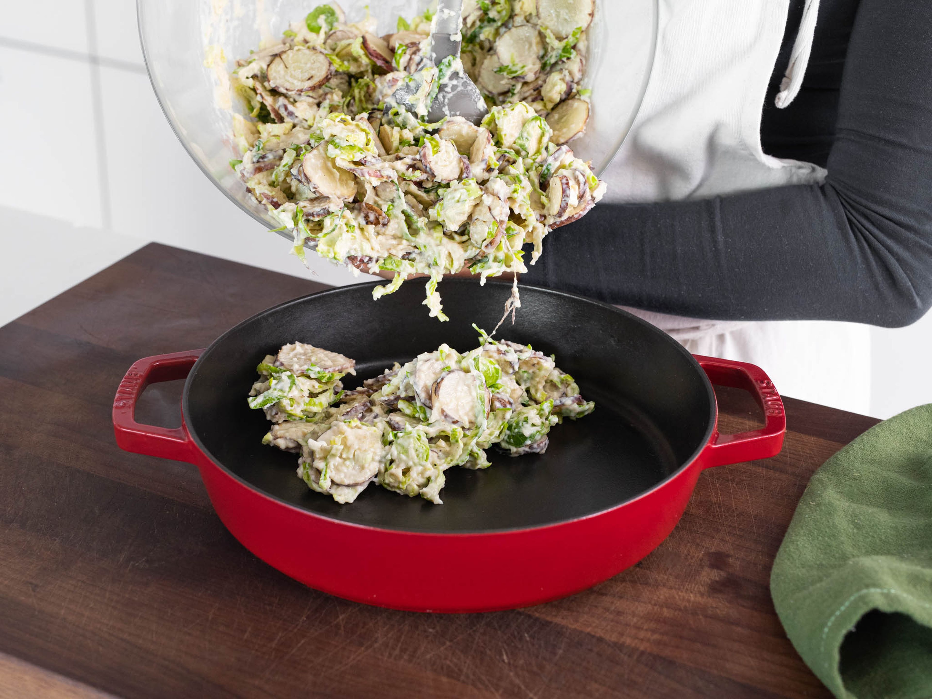 Mix sunchokes and brussel sprouts with Parmesan and thyme, pour over sauce. Transfer to a cast iron pan and bake at 180°C/350°F for approx. 40 - 50 min. Enjoy!