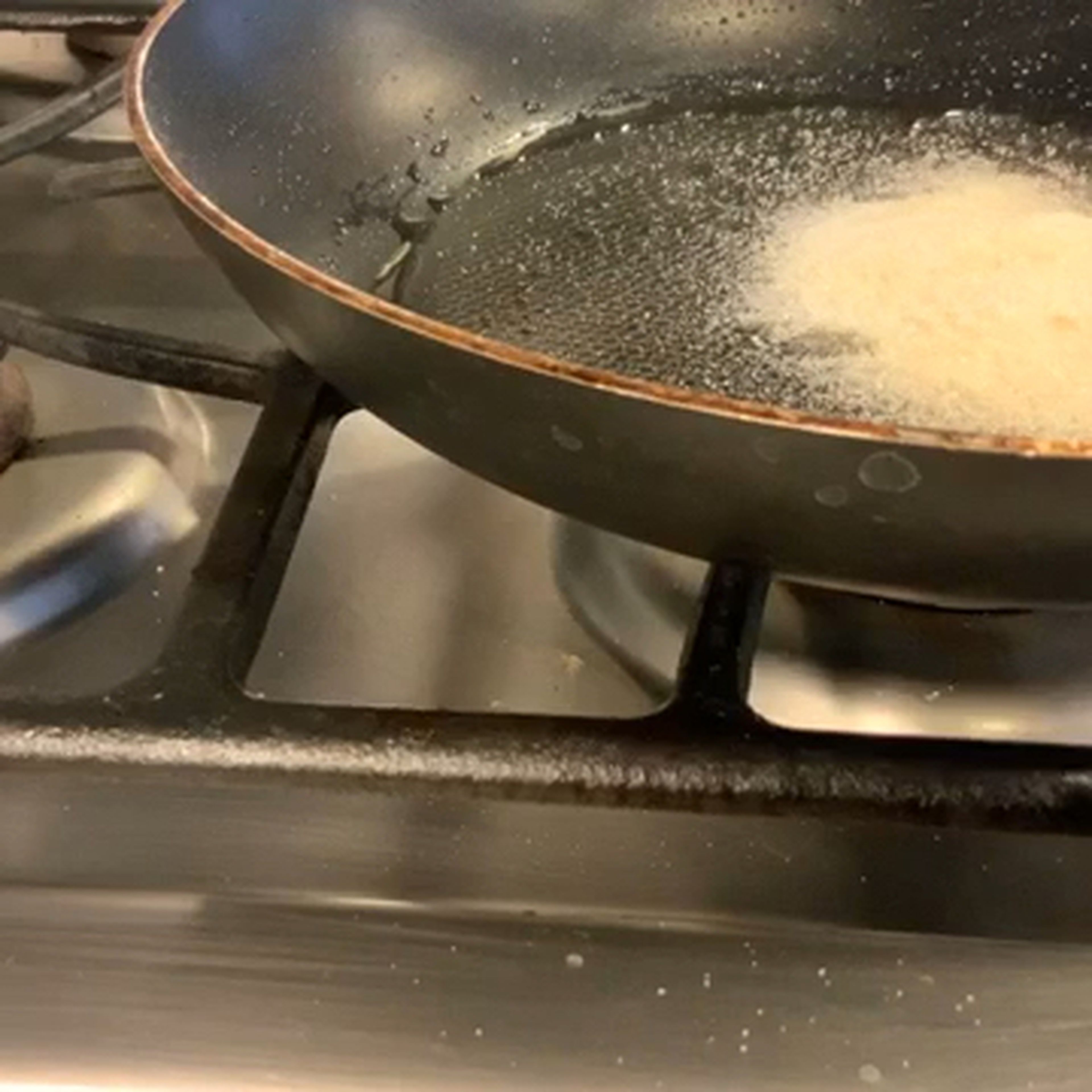 Take the sweet potatoes our of the frying pan and again on the plate with a paper towel to drain the oil out. Then, clean the pan you used and then add sugar, honey, and water. Do not stirr it. Once it is clear, add the sweet potatoes once again and fry it for a few minutes. Transfer it on a serving plate and enjoy!