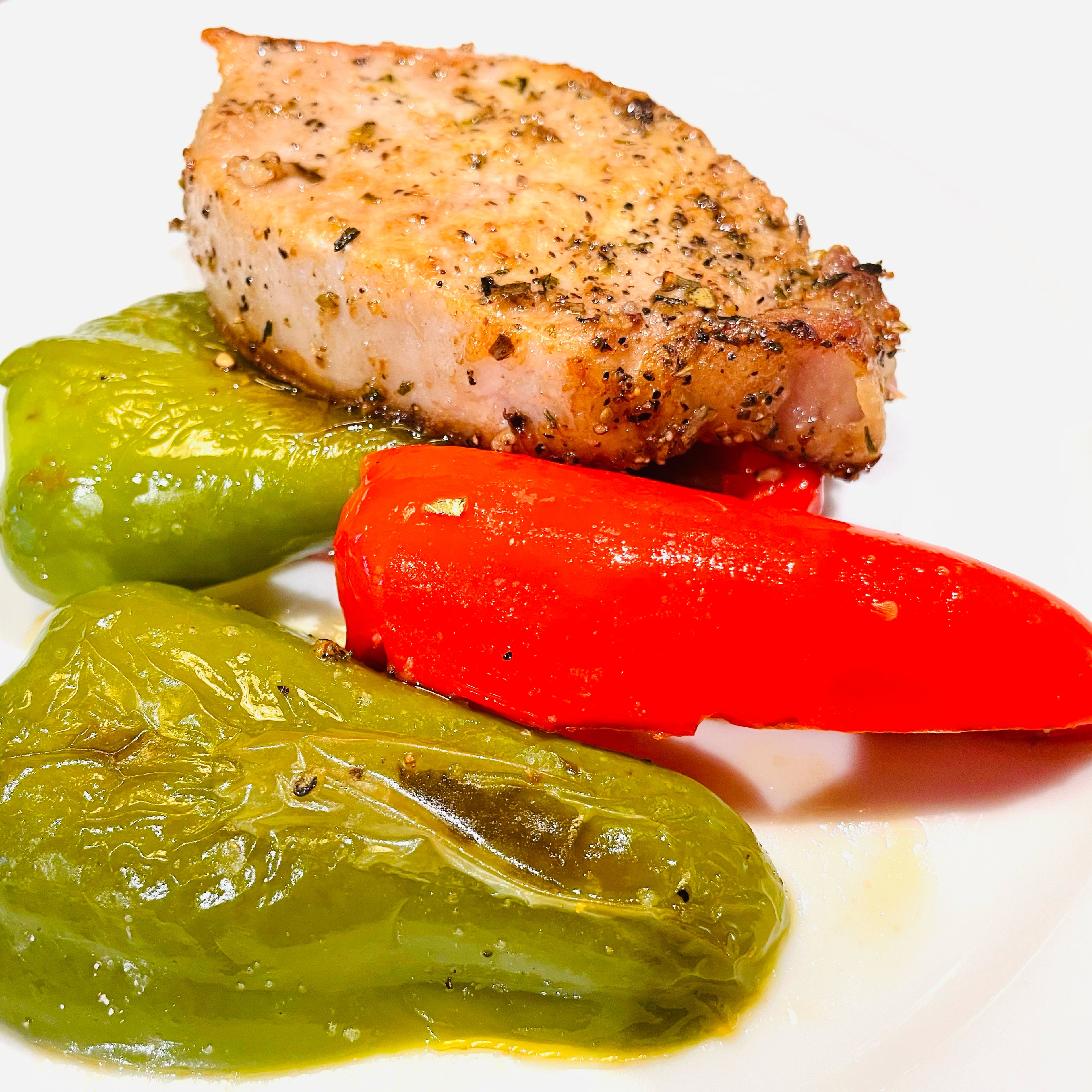 Roast pork loin with bell peppers