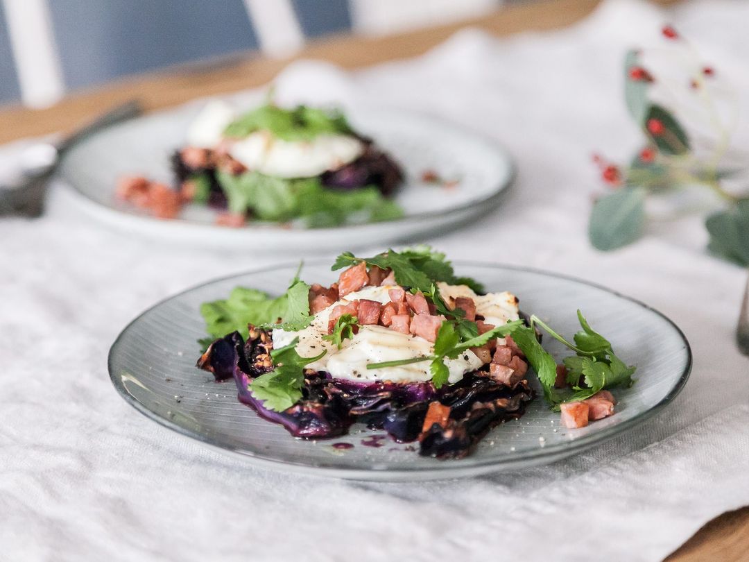 Roasted red cabbage steaks with goat cheese and bacon
