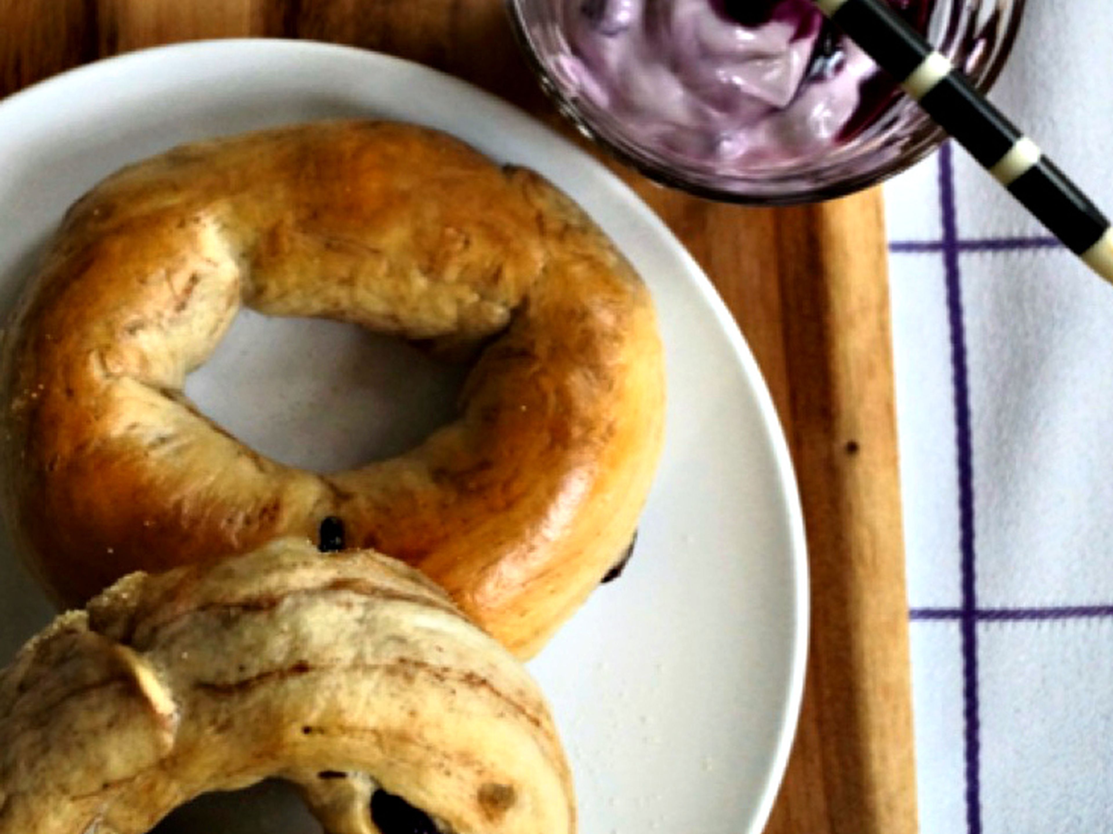 Cinnamon bagel with berry cream cheese