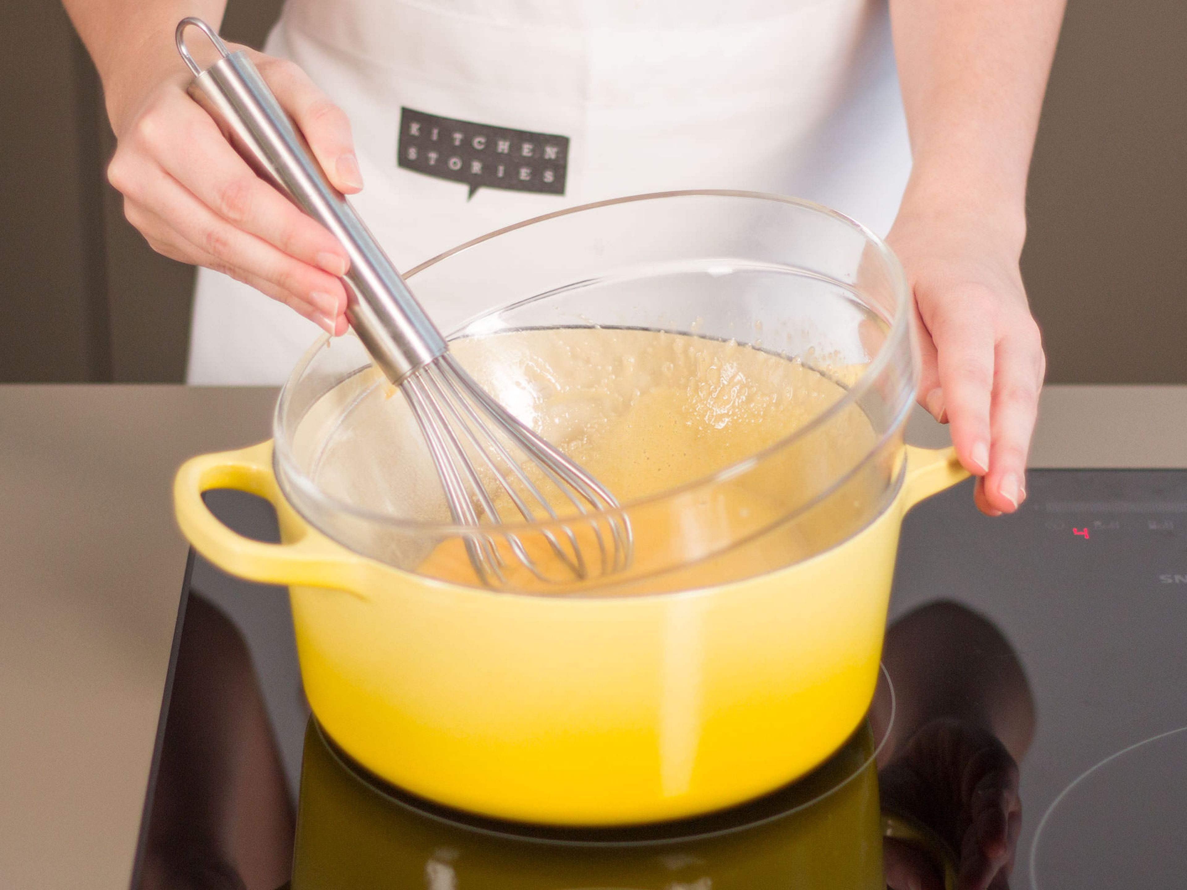 Separate part of the eggs. Add yolk as well as remaining eggs to a large bowl. Place bowl on the water bath and whisk eggs until they are thickened.