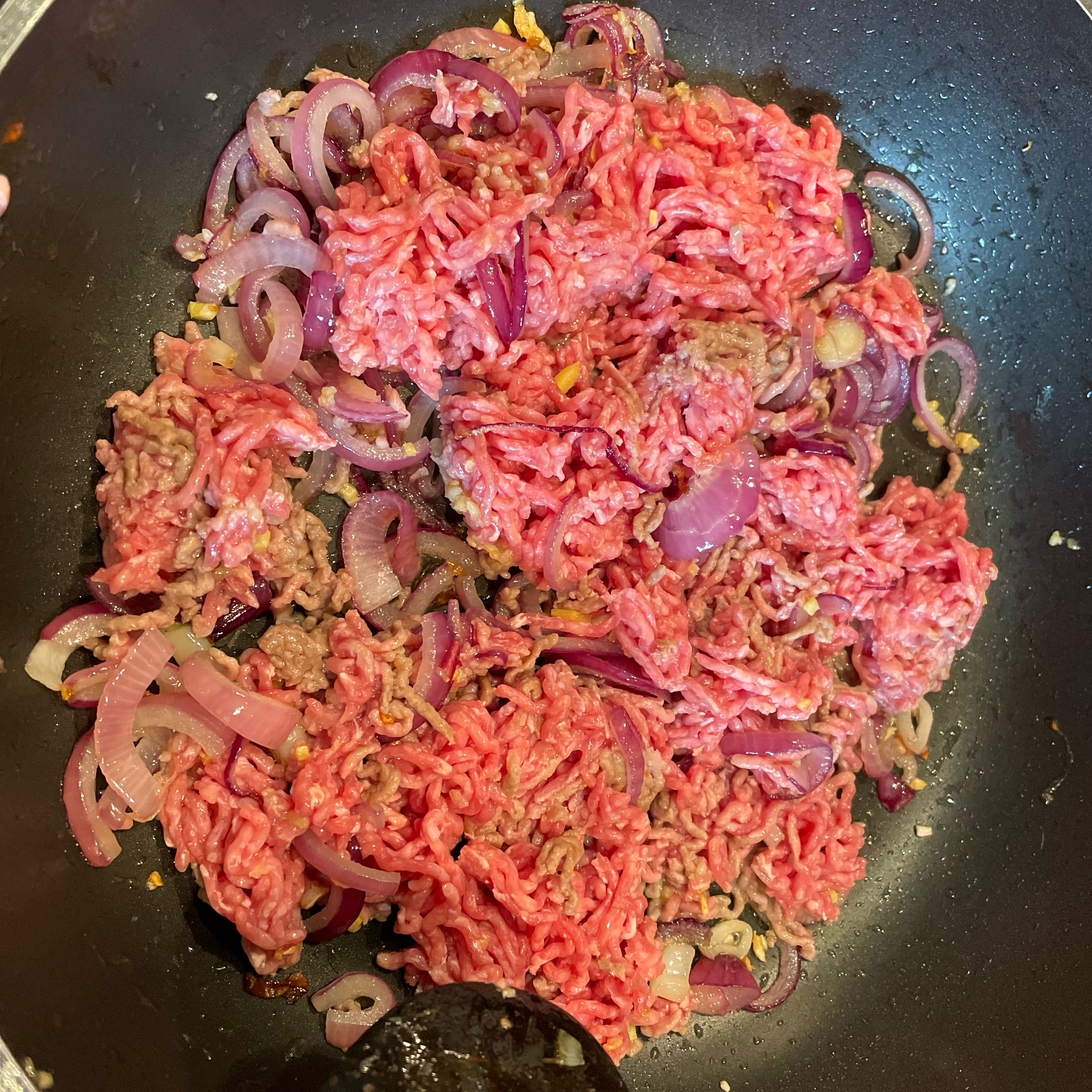 Add ground beef, mix and cook about 5min on medium heat till changing color.