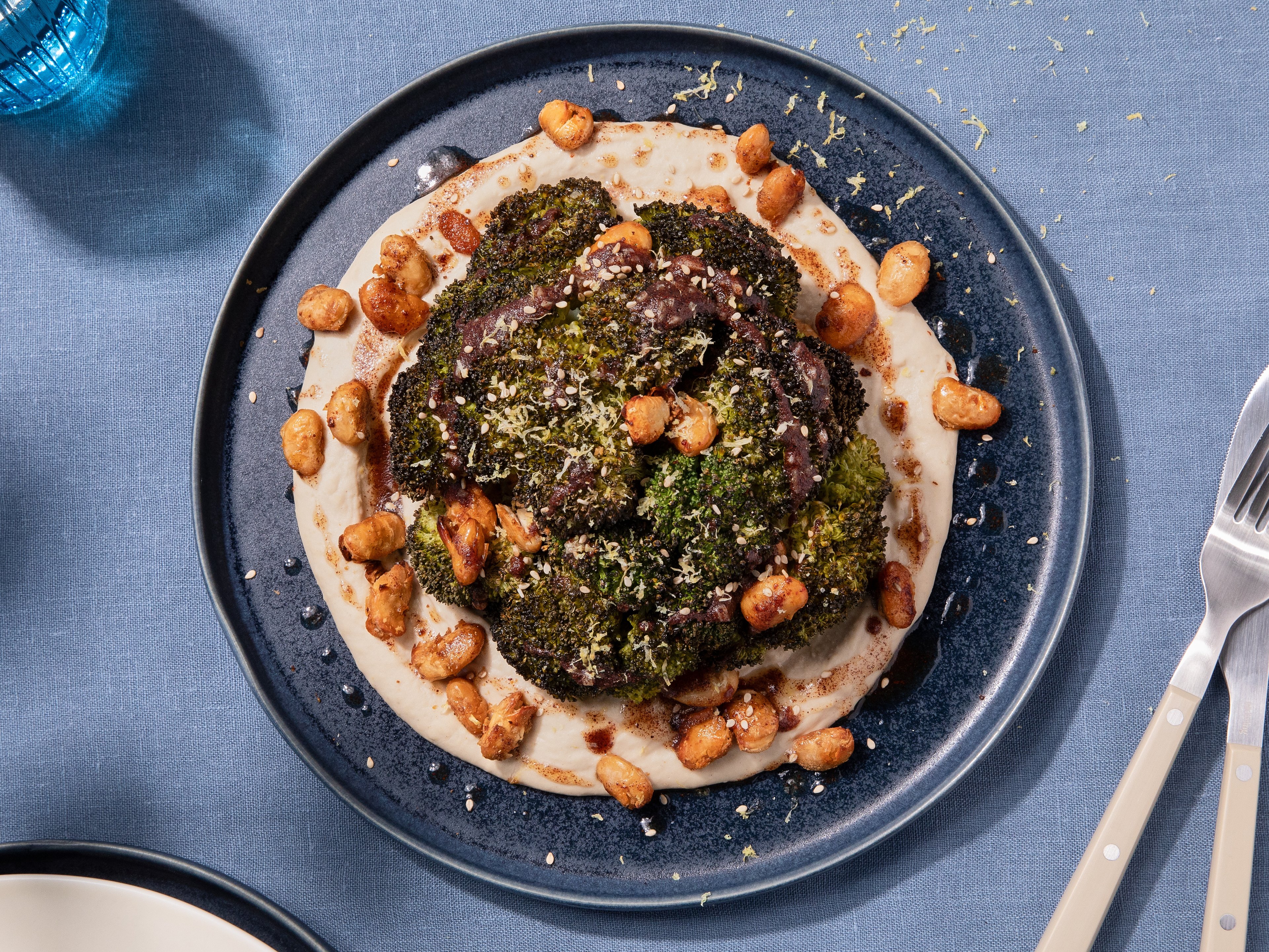 Whole roasted broccoli with bean hummus and sumac butter