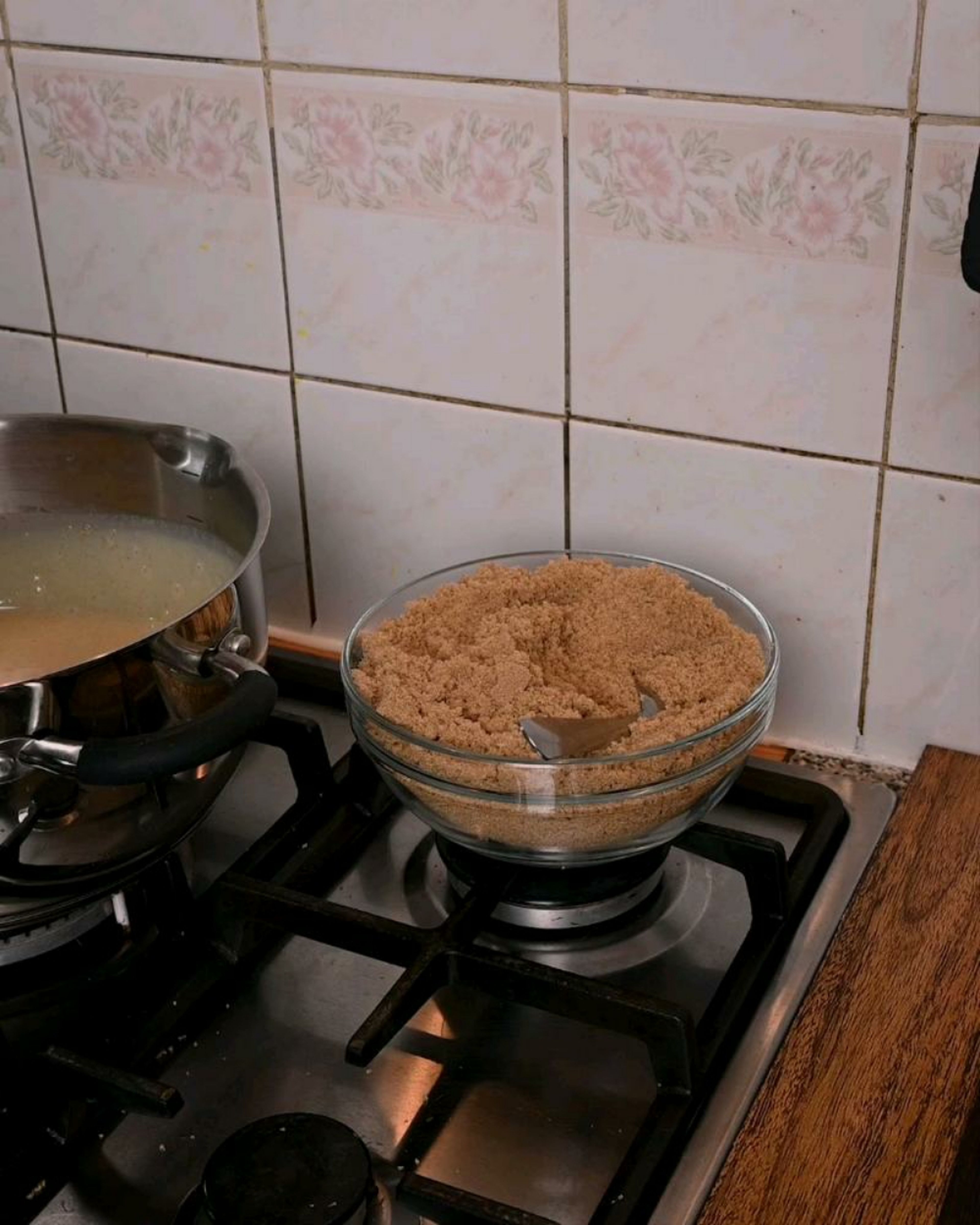 Wash the condensed milk tins with water and add the water to the saucepan, and mix well combining the water with the condensed milk.